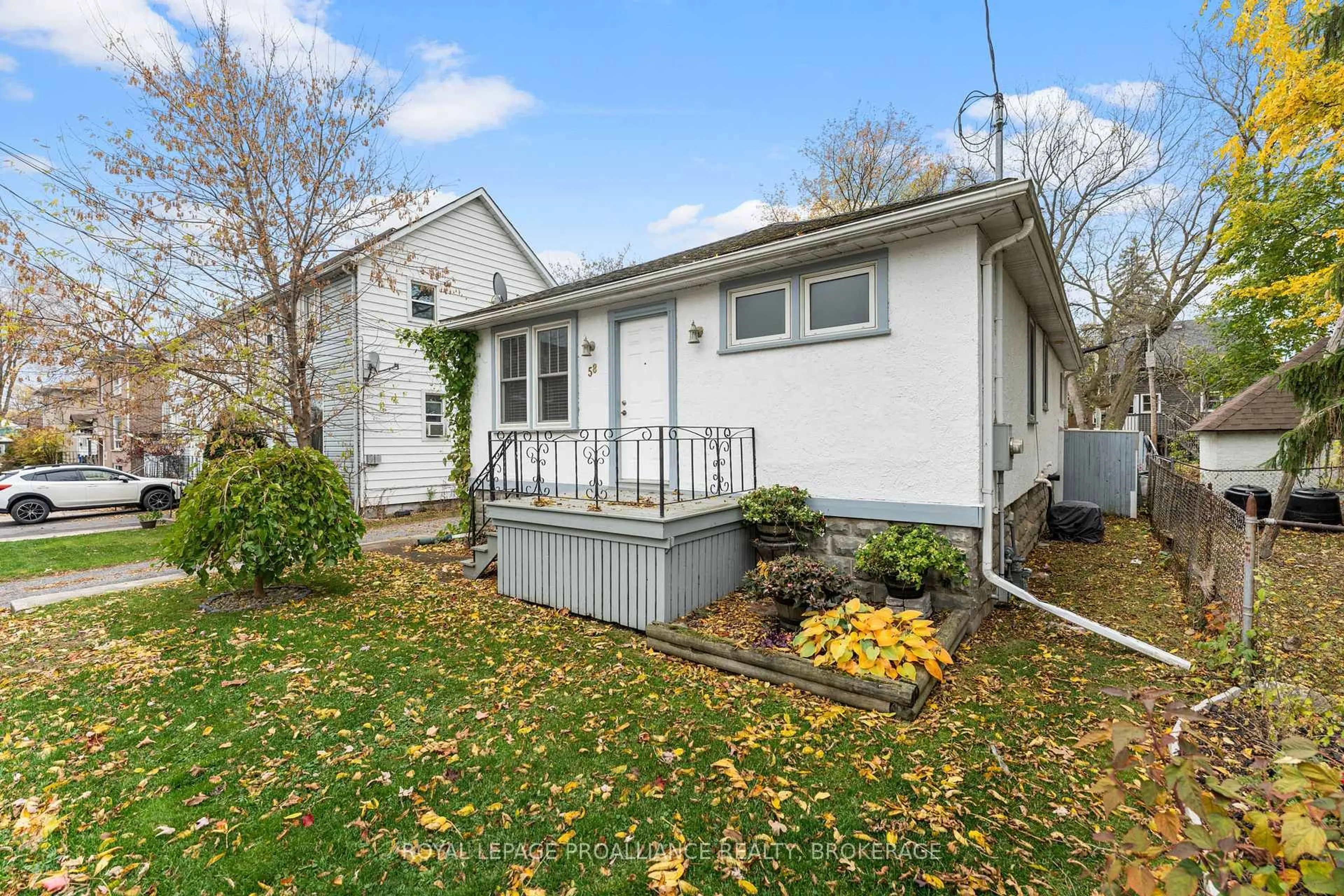 Home with vinyl exterior material, street for 58 Stanley St, Kingston Ontario K7K 1Y1