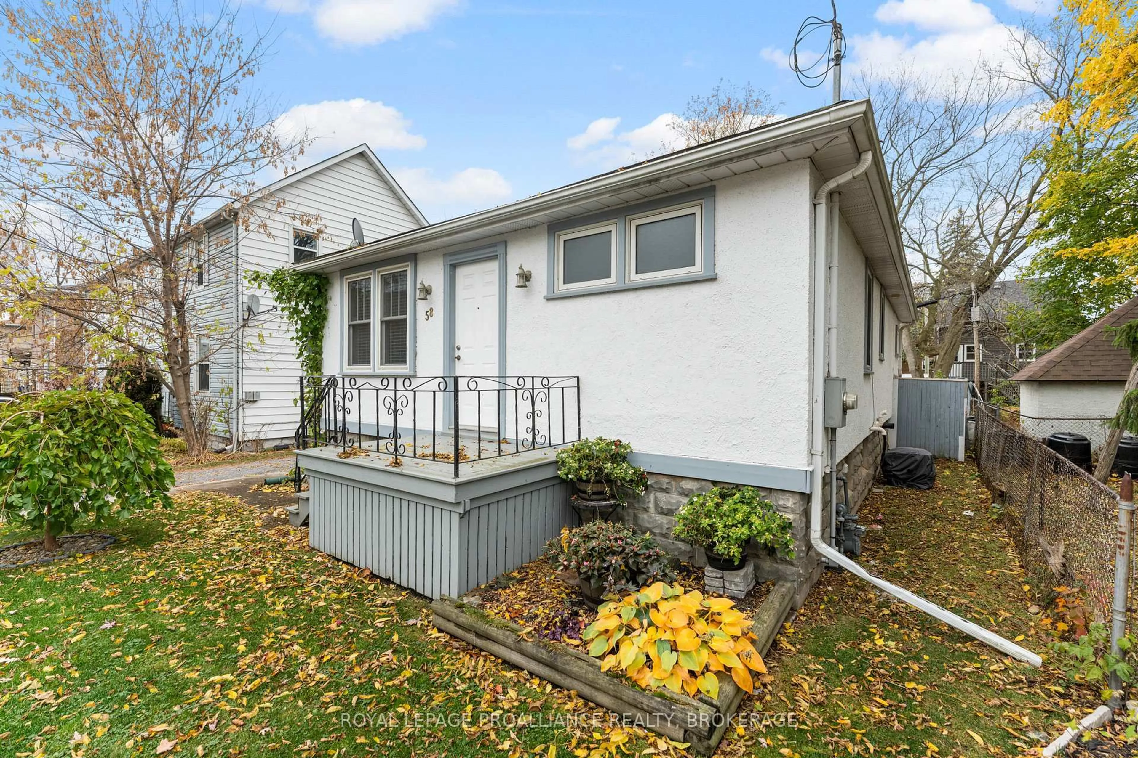 Home with vinyl exterior material, street for 58 Stanley St, Kingston Ontario K7K 1Y1