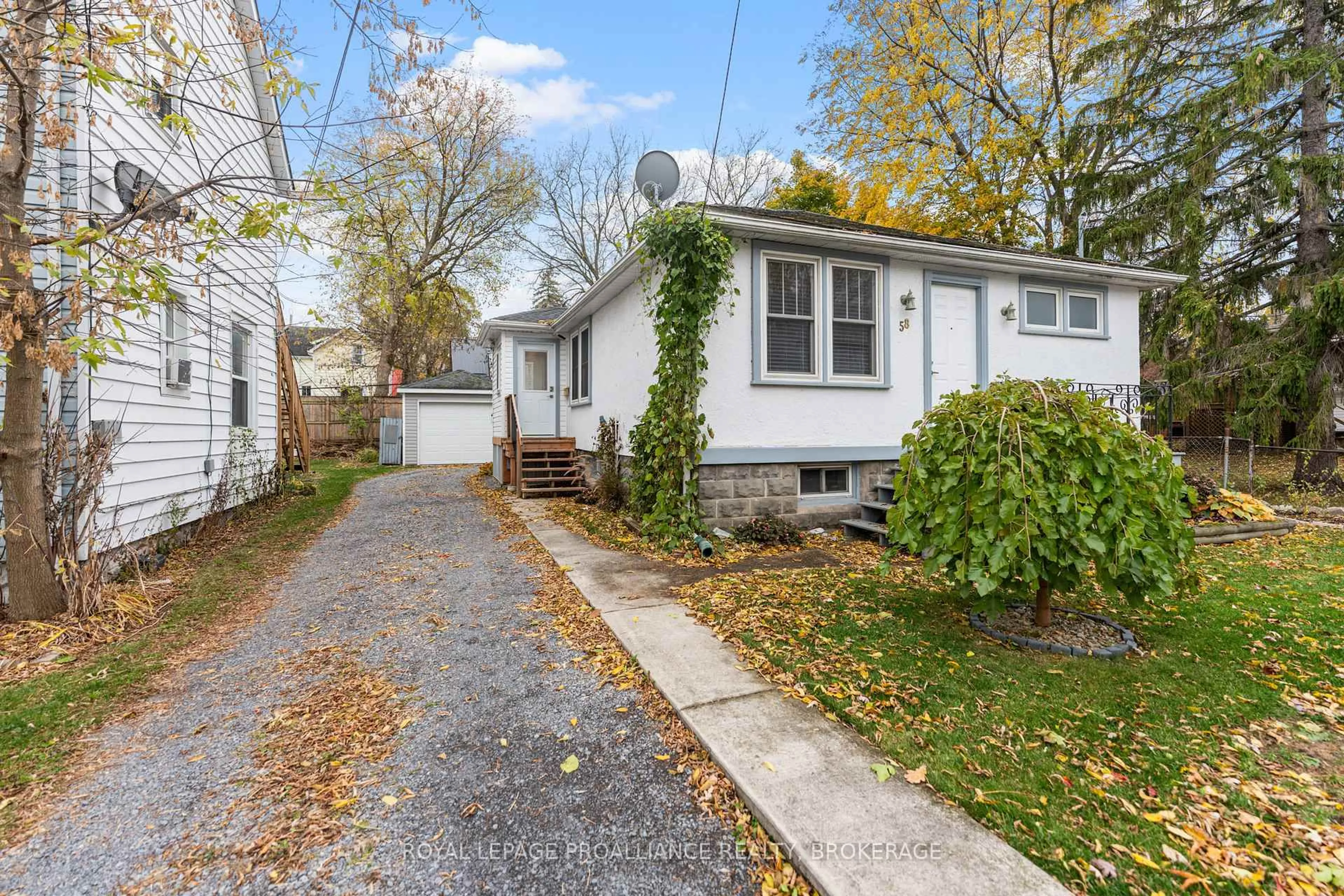 Home with vinyl exterior material, street for 58 Stanley St, Kingston Ontario K7K 1Y1