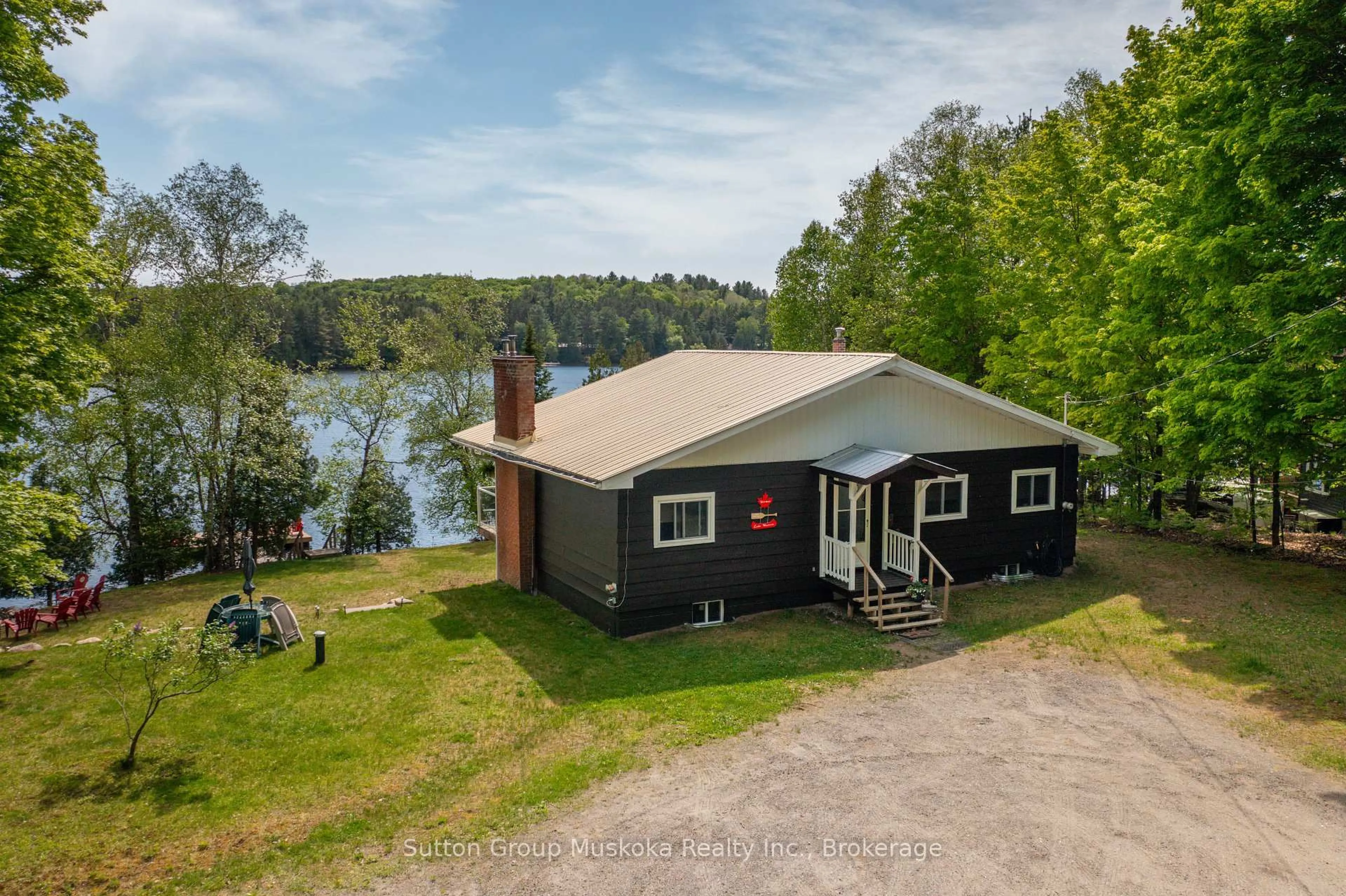 A pic from outside/outdoor area/front of a property/back of a property/a pic from drone, water/lake/river/ocean view for 562 and 568 East Waseosa Lake Rd, Huntsville Ontario P1H 2J4
