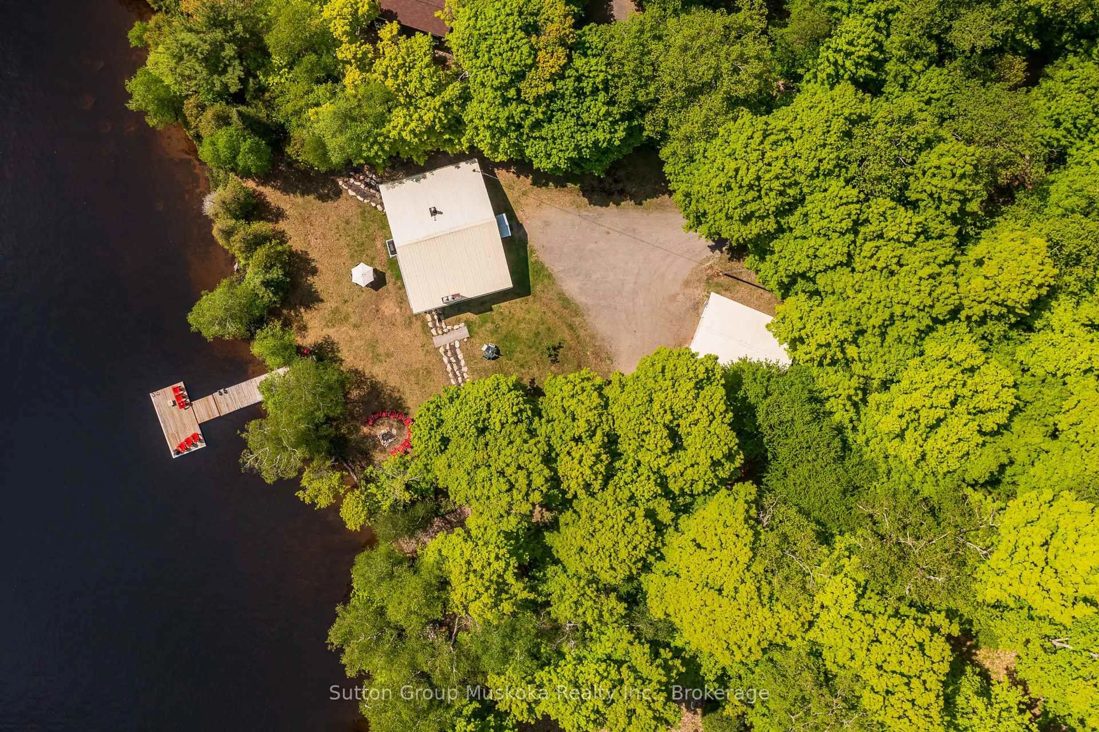 A pic from outside/outdoor area/front of a property/back of a property/a pic from drone, water/lake/river/ocean view for 562 and 568 East Waseosa Lake Rd, Huntsville Ontario P1H 2J4