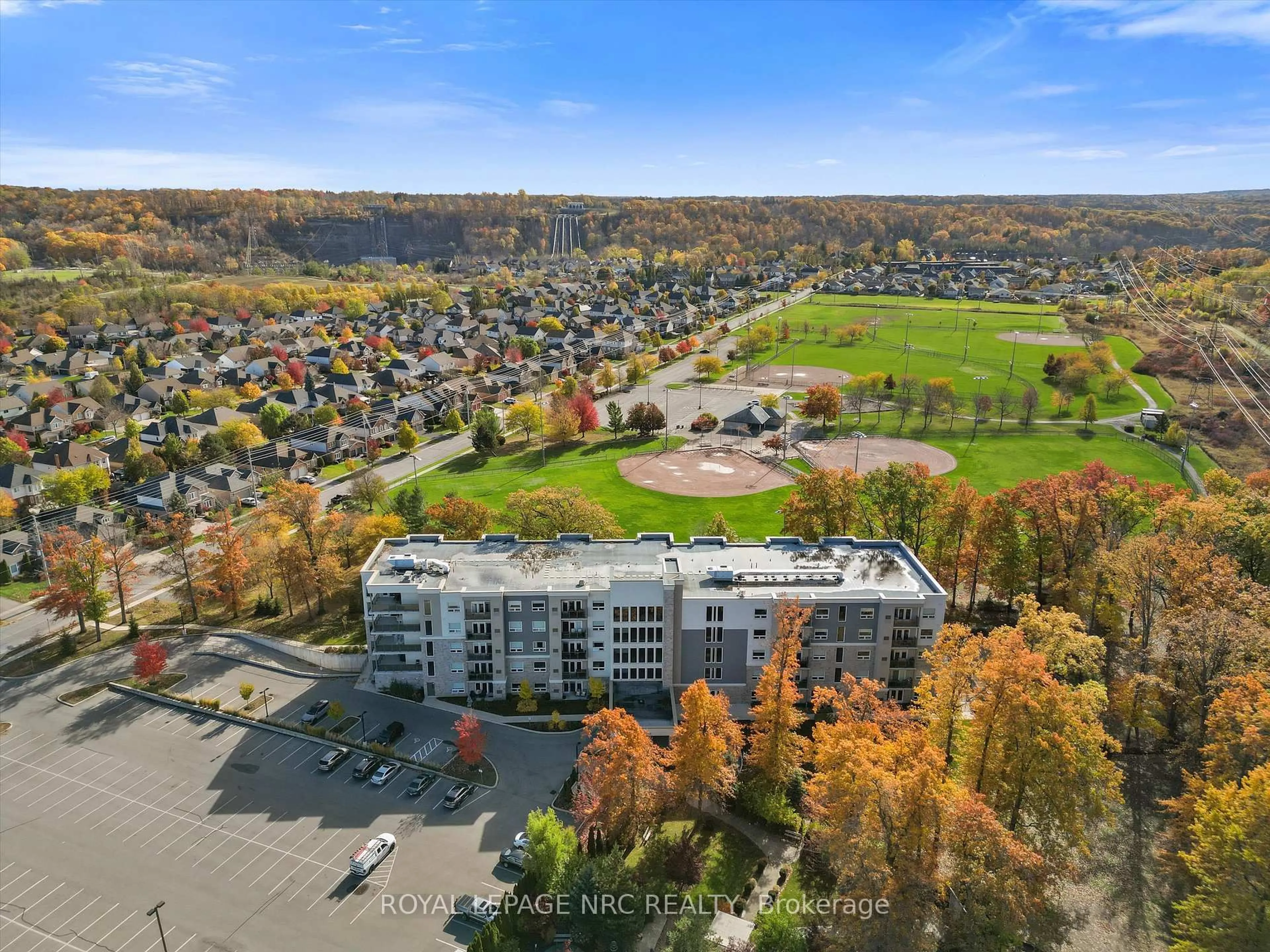 A pic from outside/outdoor area/front of a property/back of a property/a pic from drone, mountain view for 105 Vansickle Rd #202, St. Catharines Ontario L2S 0G4