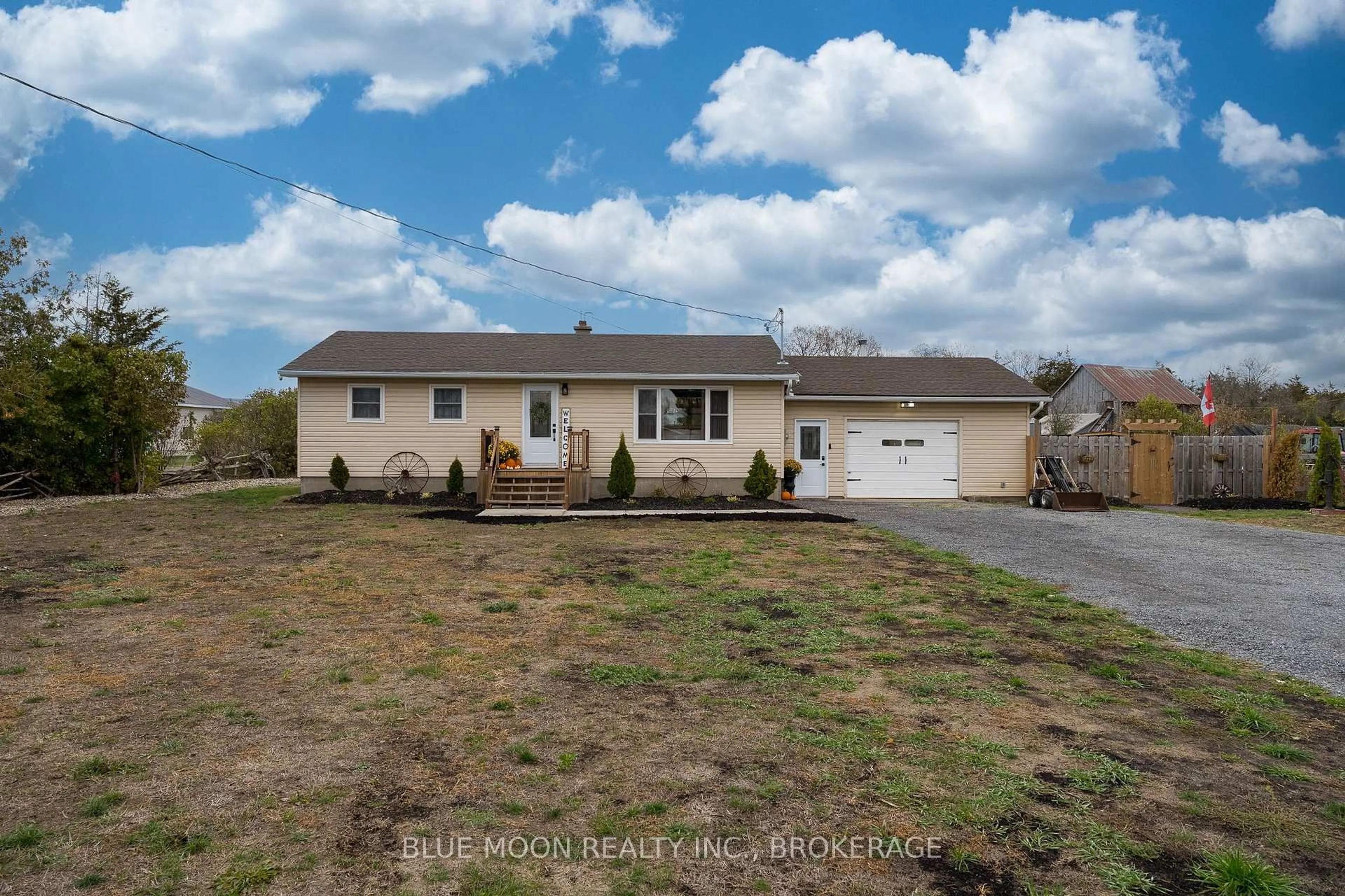 A pic from outside/outdoor area/front of a property/back of a property/a pic from drone, street for 601 Millhaven Rd, Bissett Creek Ontario K0H 2H0