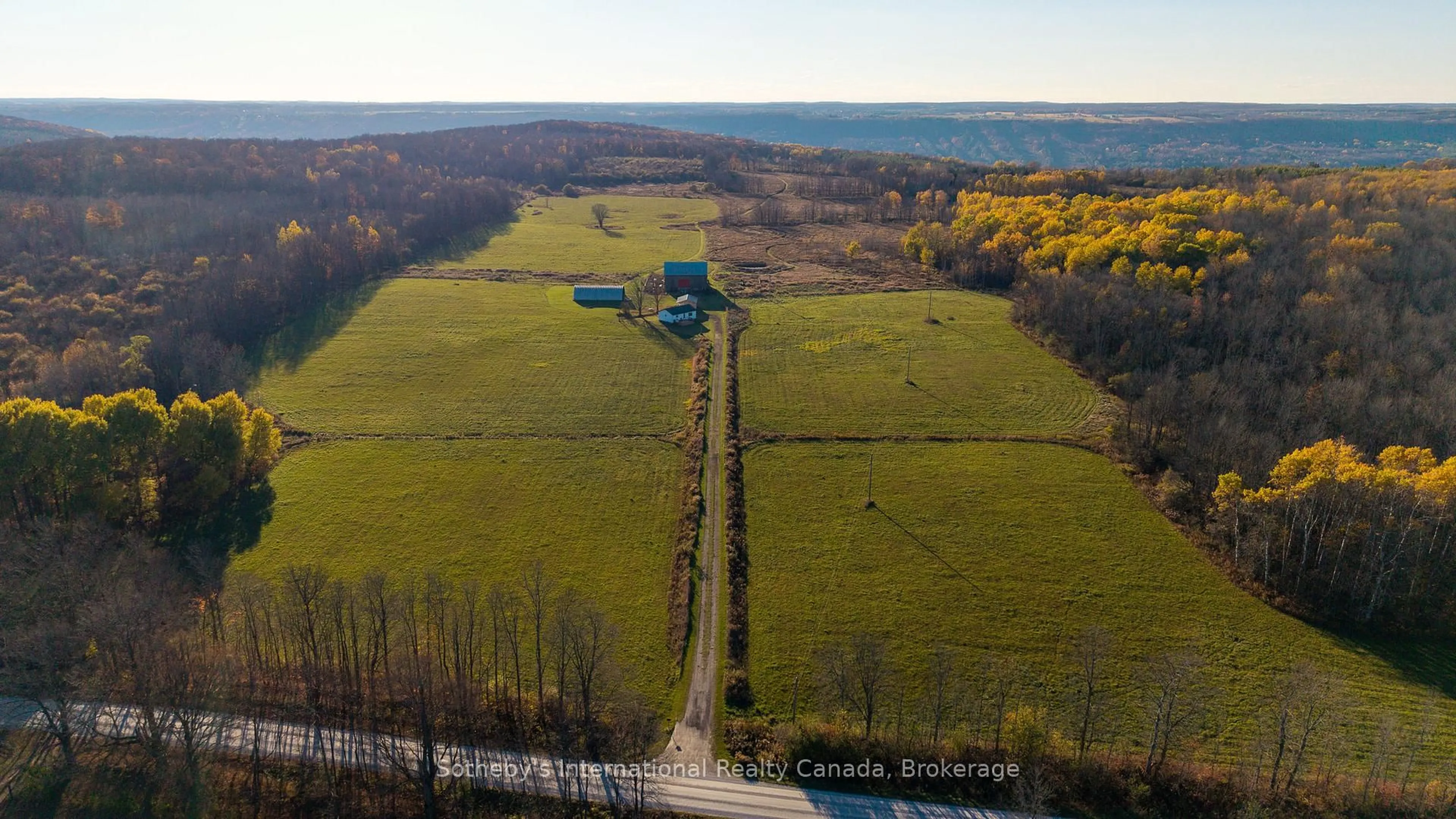 A pic from outside/outdoor area/front of a property/back of a property/a pic from drone, water/lake/river/ocean view for 315298 3rd Line A, Grey Highlands Ontario N0C 1E0
