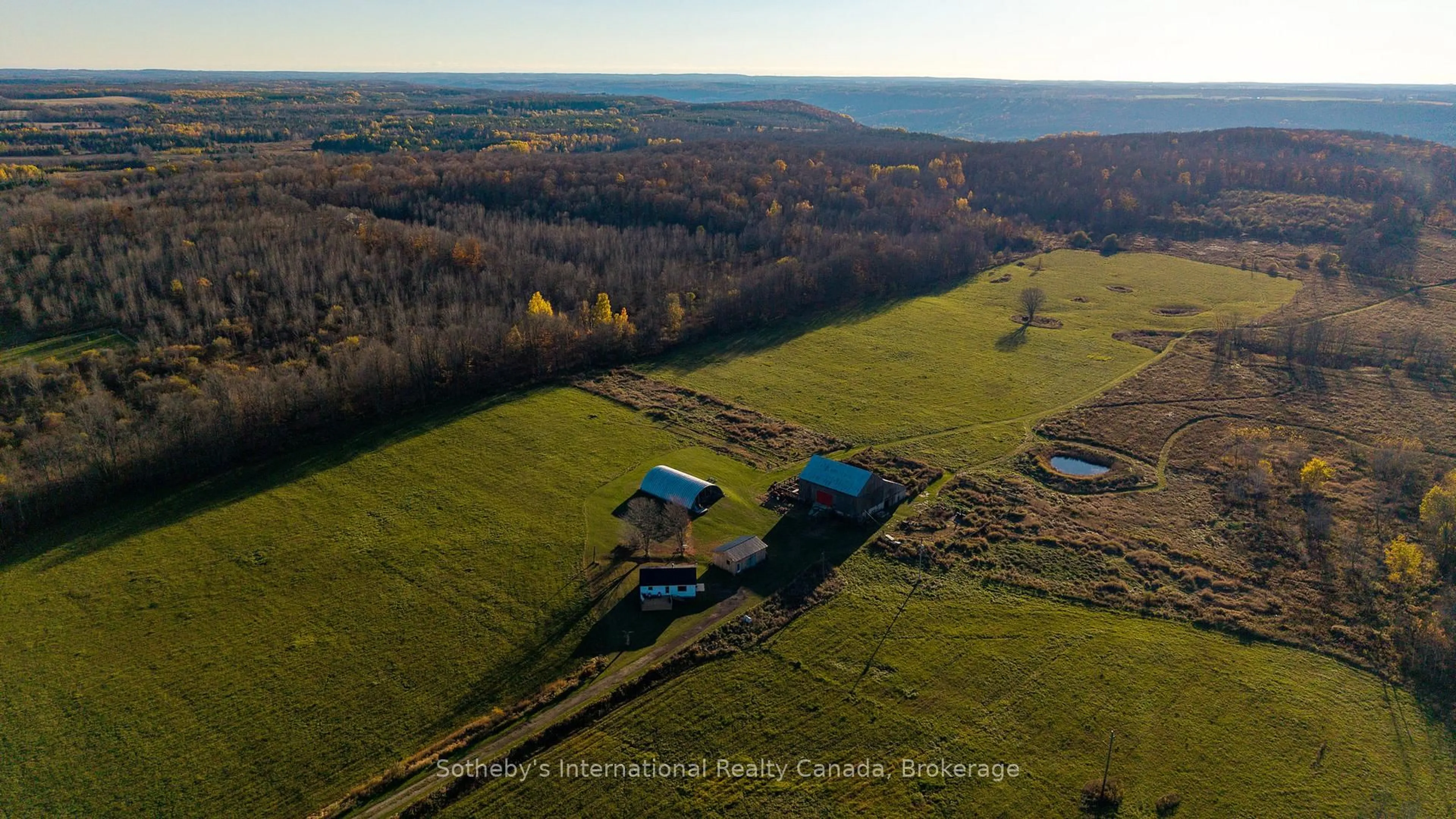 A pic from outside/outdoor area/front of a property/back of a property/a pic from drone, water/lake/river/ocean view for 315298 3rd Line A, Grey Highlands Ontario N0C 1E0