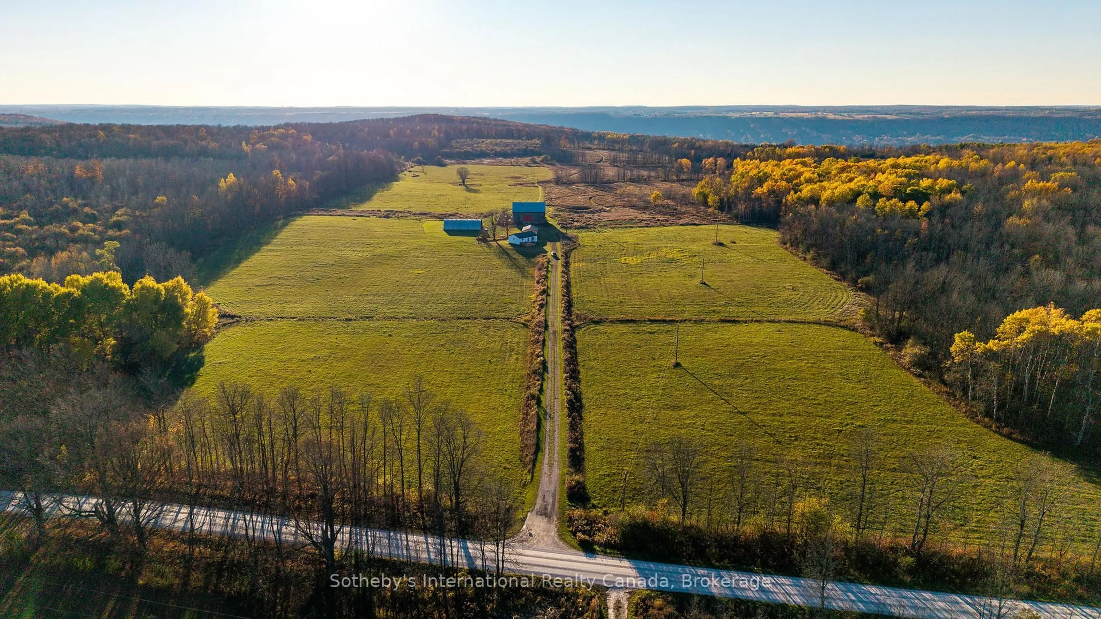 A pic from outside/outdoor area/front of a property/back of a property/a pic from drone, water/lake/river/ocean view for 315298 3rd Line A, Grey Highlands Ontario N0C 1E0