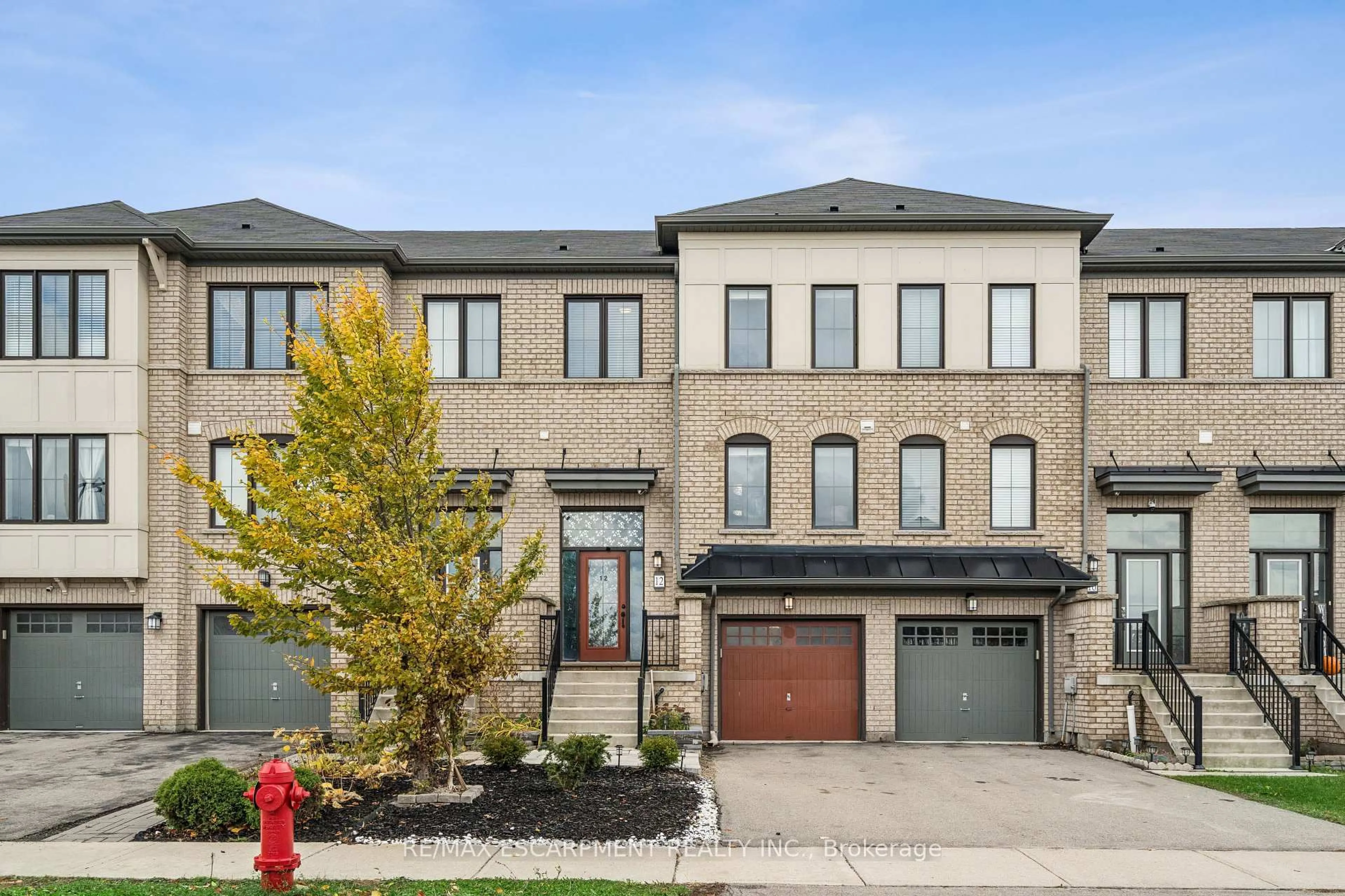 Home with brick exterior material, street for 12 Crafter Cres, Hamilton Ontario L8J 0H6