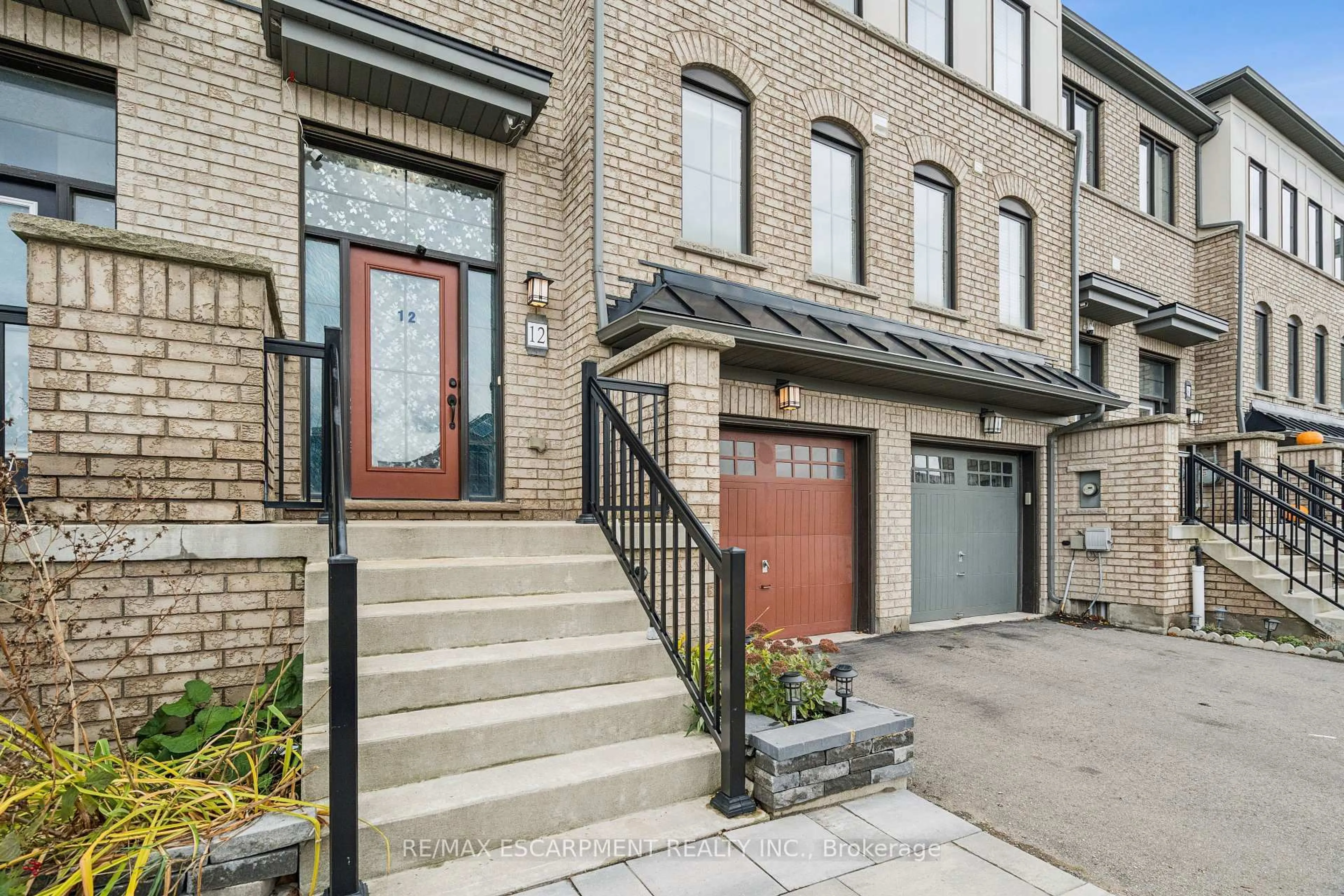 Home with brick exterior material, street for 12 Crafter Cres, Hamilton Ontario L8J 0H6