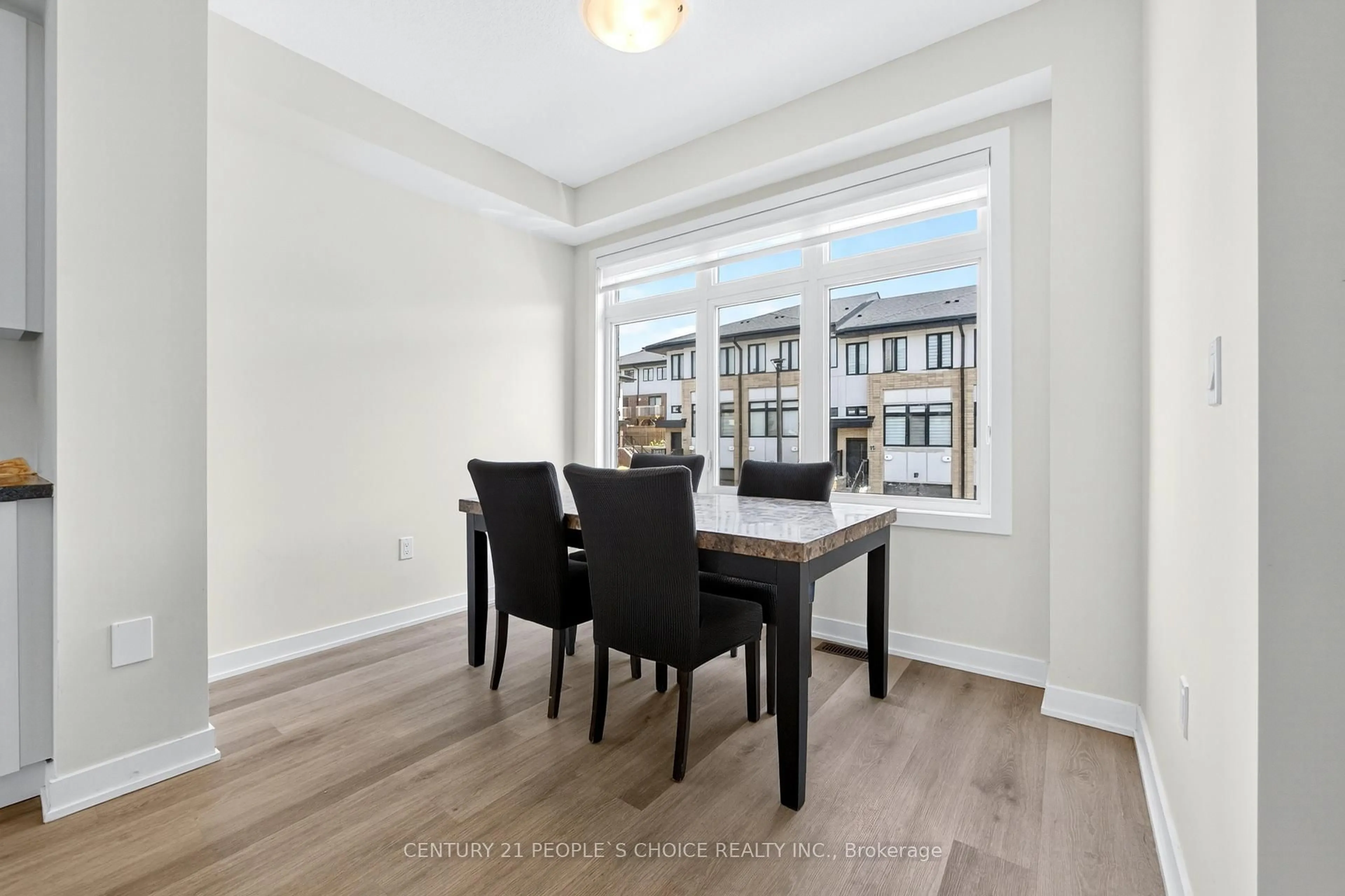 Dining room, wood/laminate floor for 527 Shaver Rd #21, Hamilton Ontario L9G 0J1