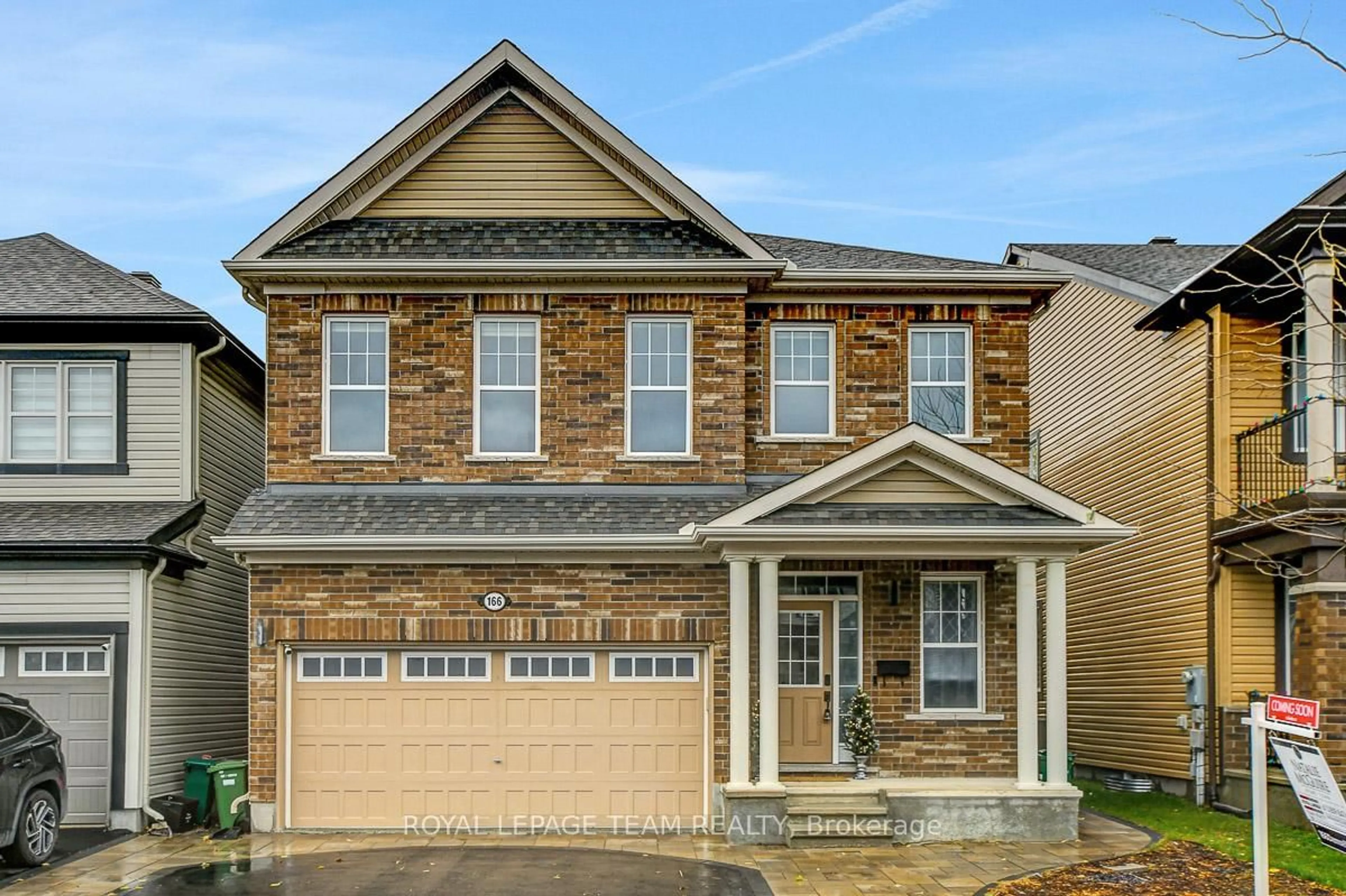 Home with brick exterior material, street for 166 Damselfly Way, Ottawa Ontario K2J 6H6