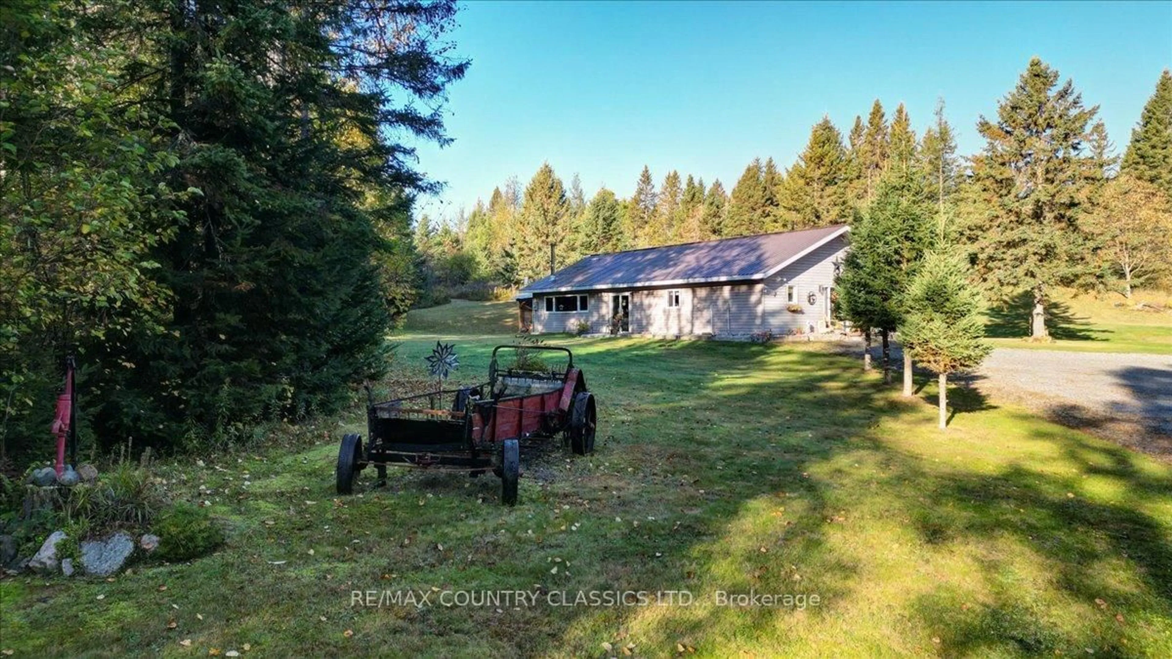 A pic from outside/outdoor area/front of a property/back of a property/a pic from drone, forest/trees view for 1689 Graphite Rd, Maynooth Ontario K0L 2S0
