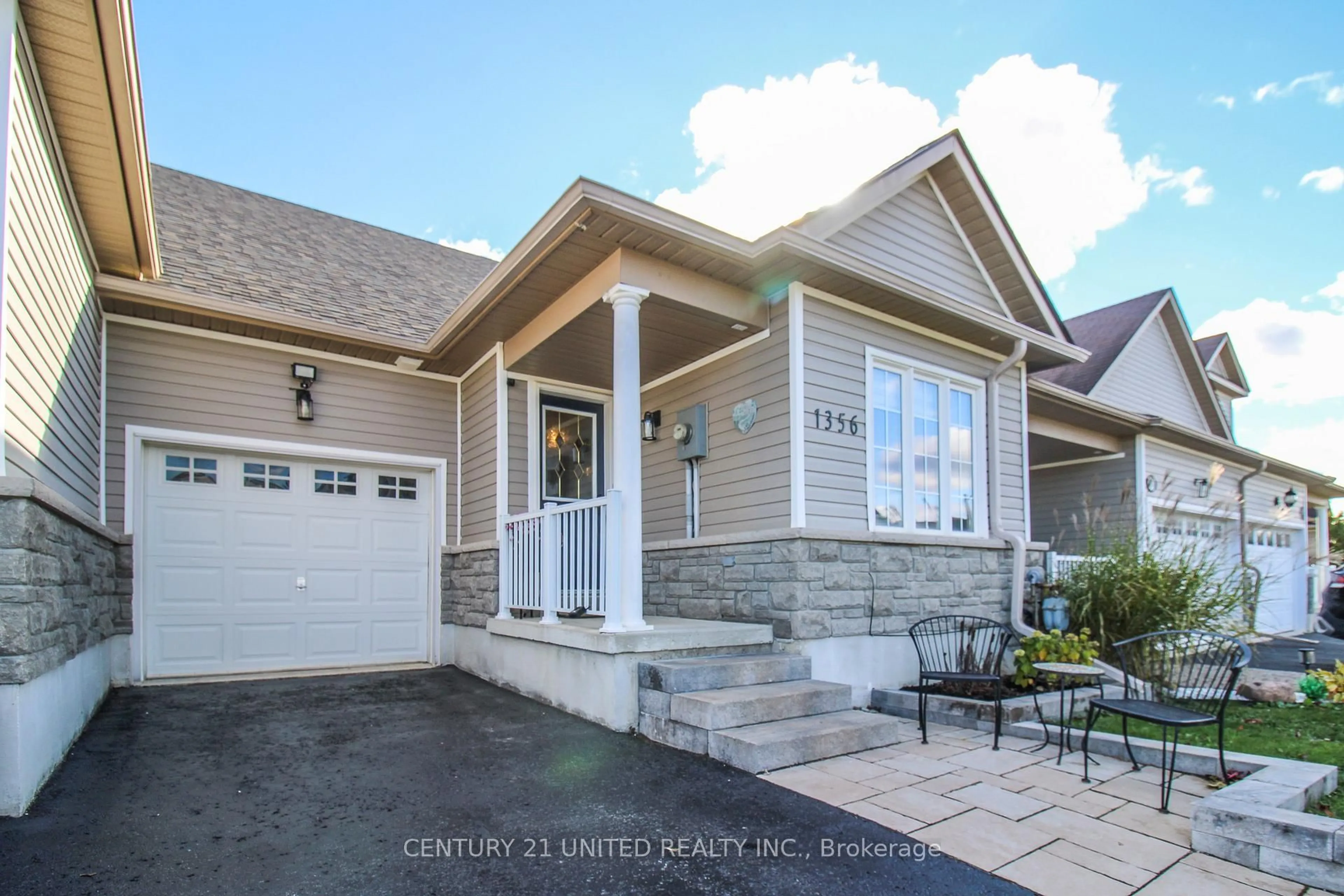 Home with vinyl exterior material, street for 1356 Ireland Dr, Peterborough Ontario K9K 0B1