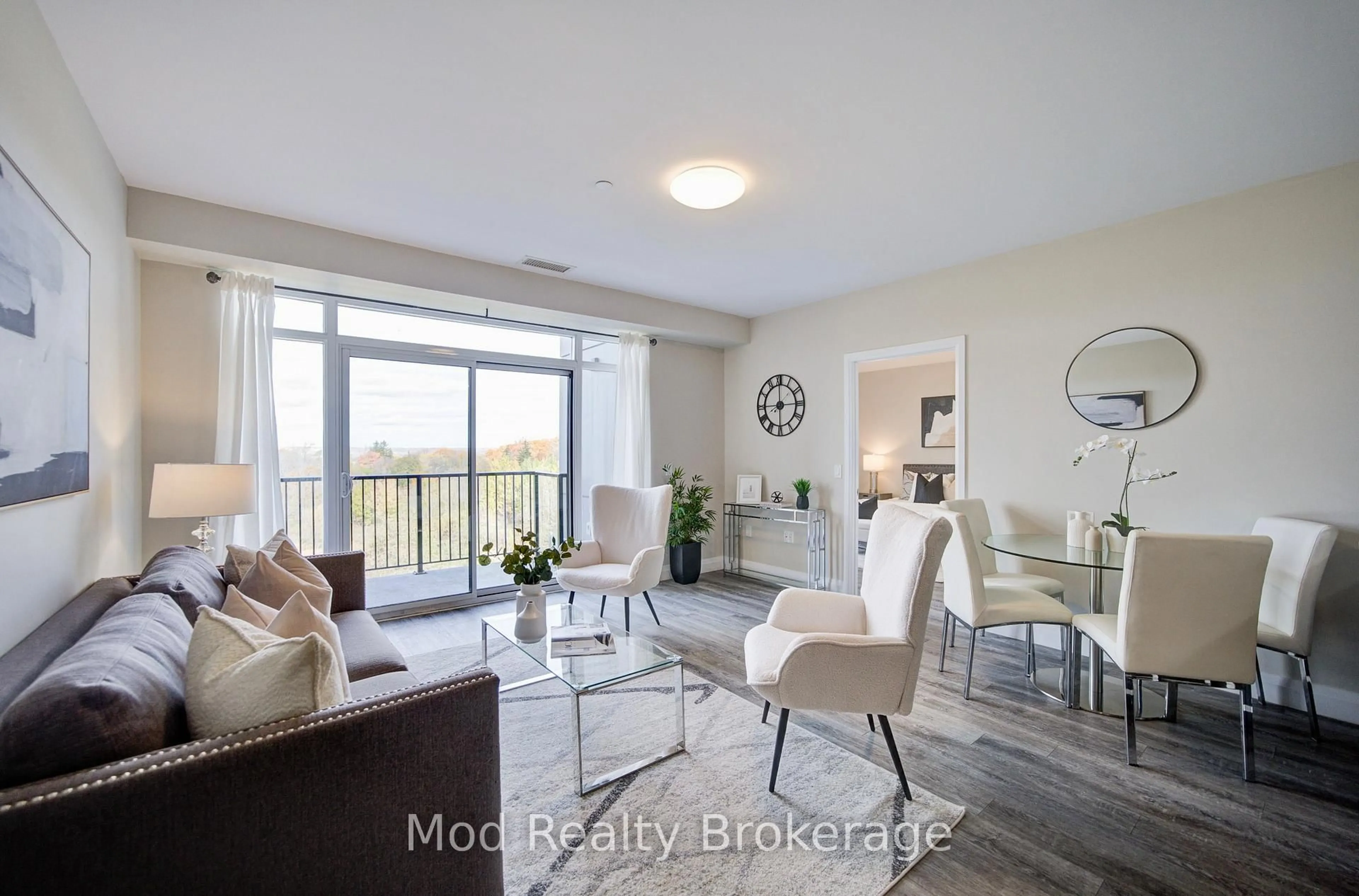 Living room with furniture, wood/laminate floor for 1 Redfern Ave #441, Hamilton Ontario L9C 0E6