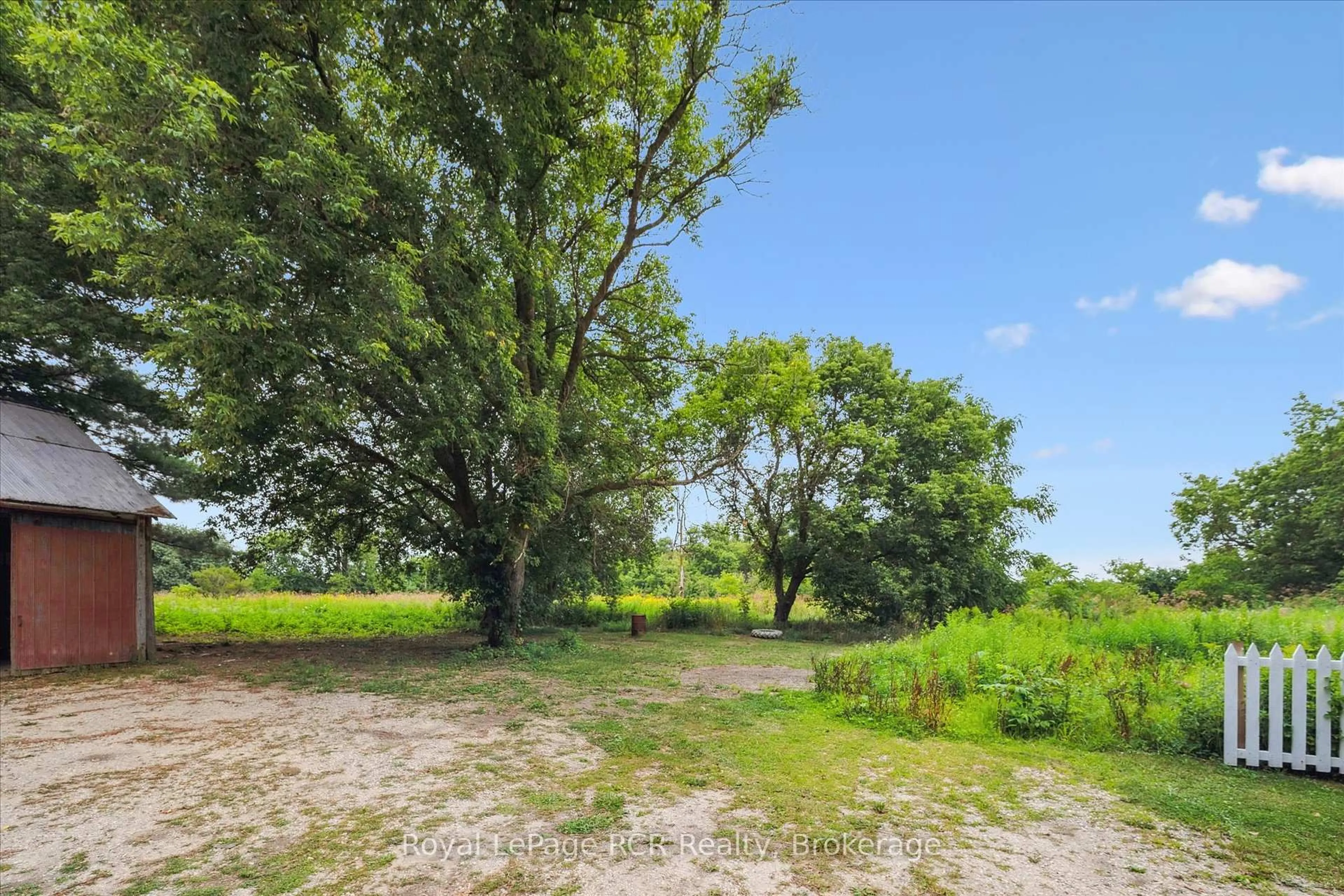 A pic from outside/outdoor area/front of a property/back of a property/a pic from drone, forest/trees view for 311207 6 Highway, Southgate Ontario N0G 2L0