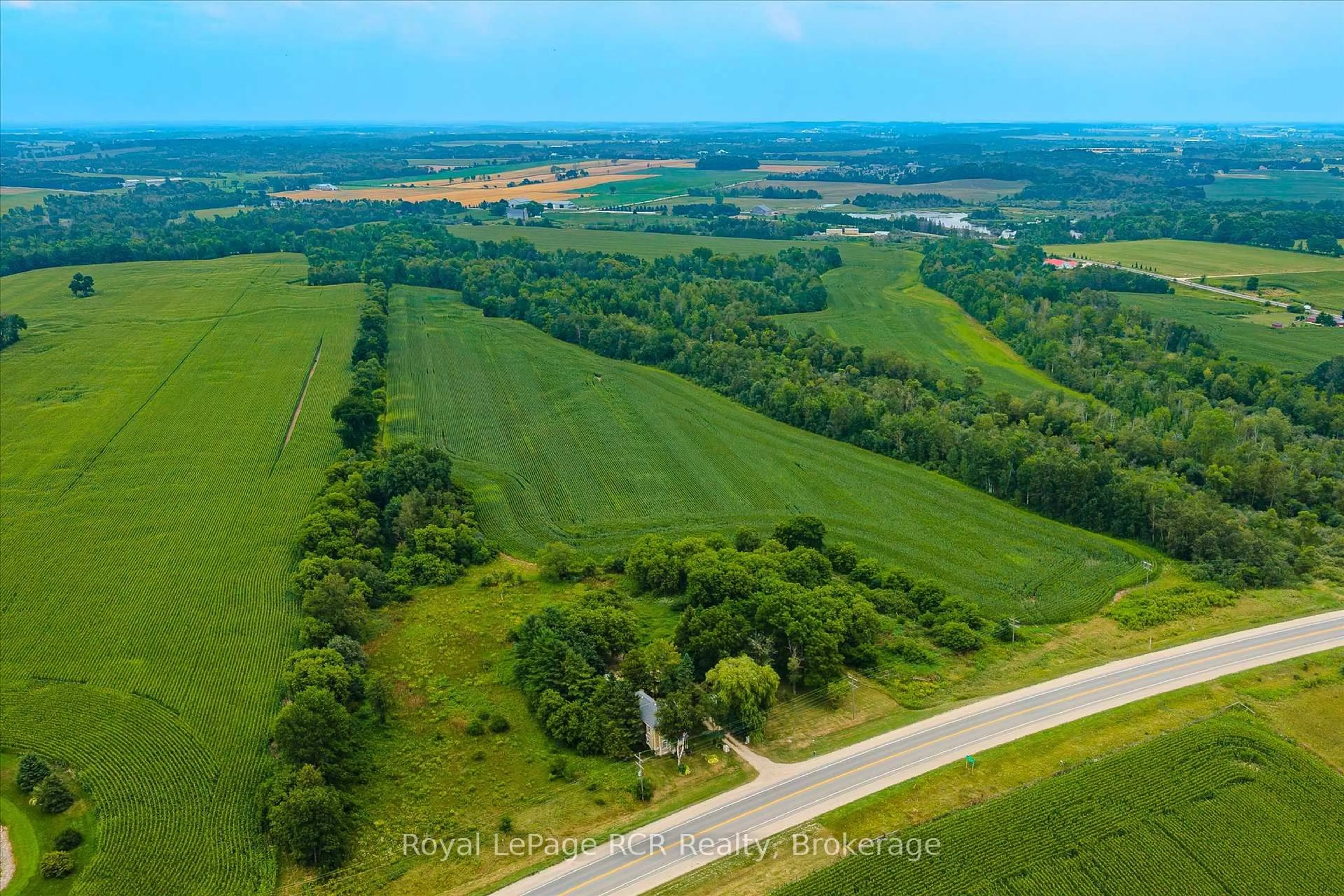 A pic from outside/outdoor area/front of a property/back of a property/a pic from drone, unknown for 311207 6 Highway, Southgate Ontario N0G 2L0