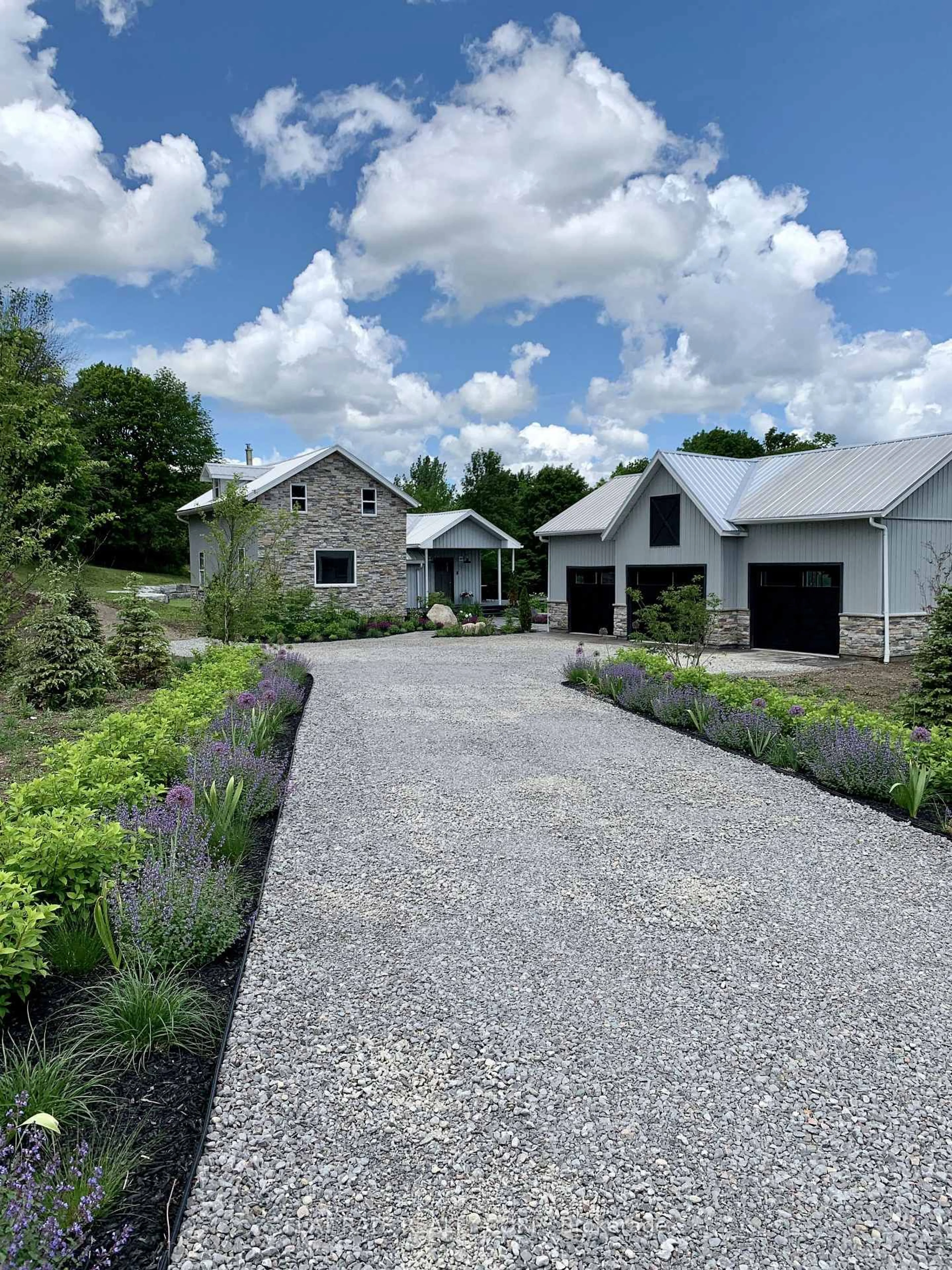 A pic from outside/outdoor area/front of a property/back of a property/a pic from drone, street for 1009 Serpent Mounds Rd, Otonabee-South Monaghan Ontario K0L 2G0