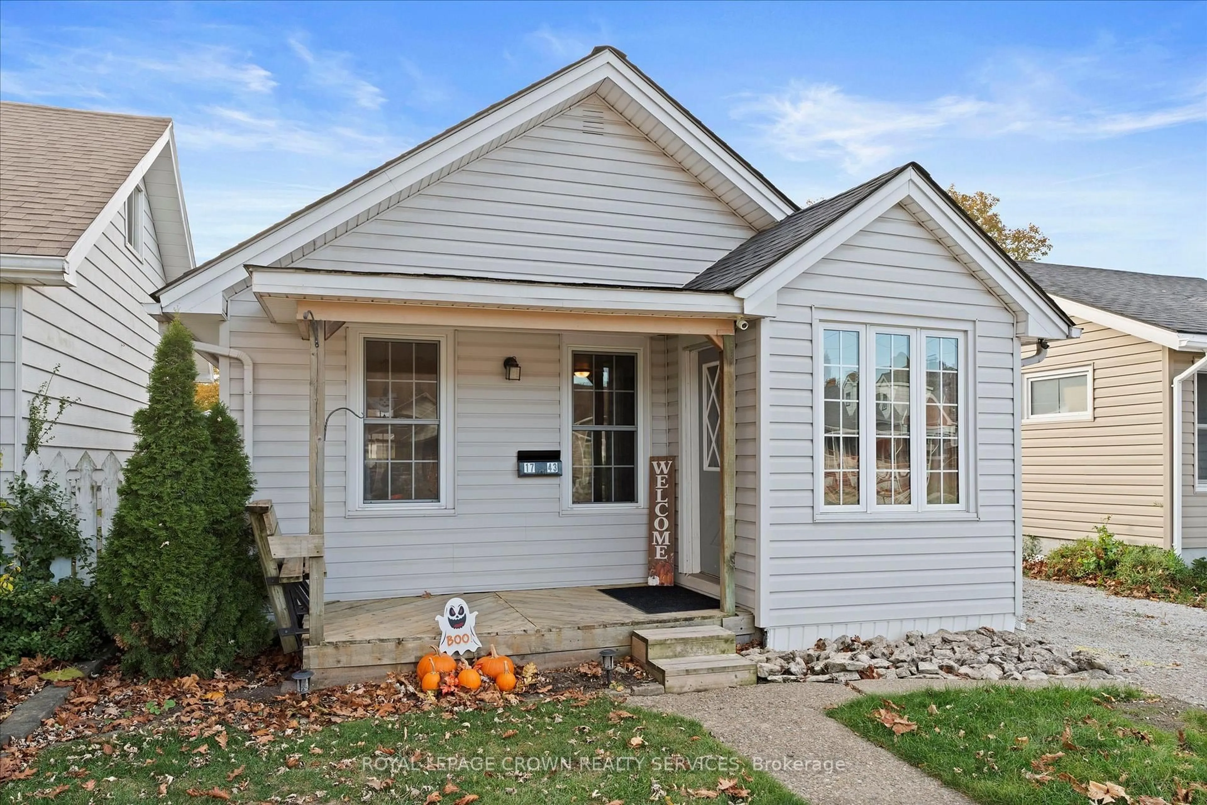 Home with vinyl exterior material, street for 1743 St Luke Rd, Windsor Ontario N8Y 3N7