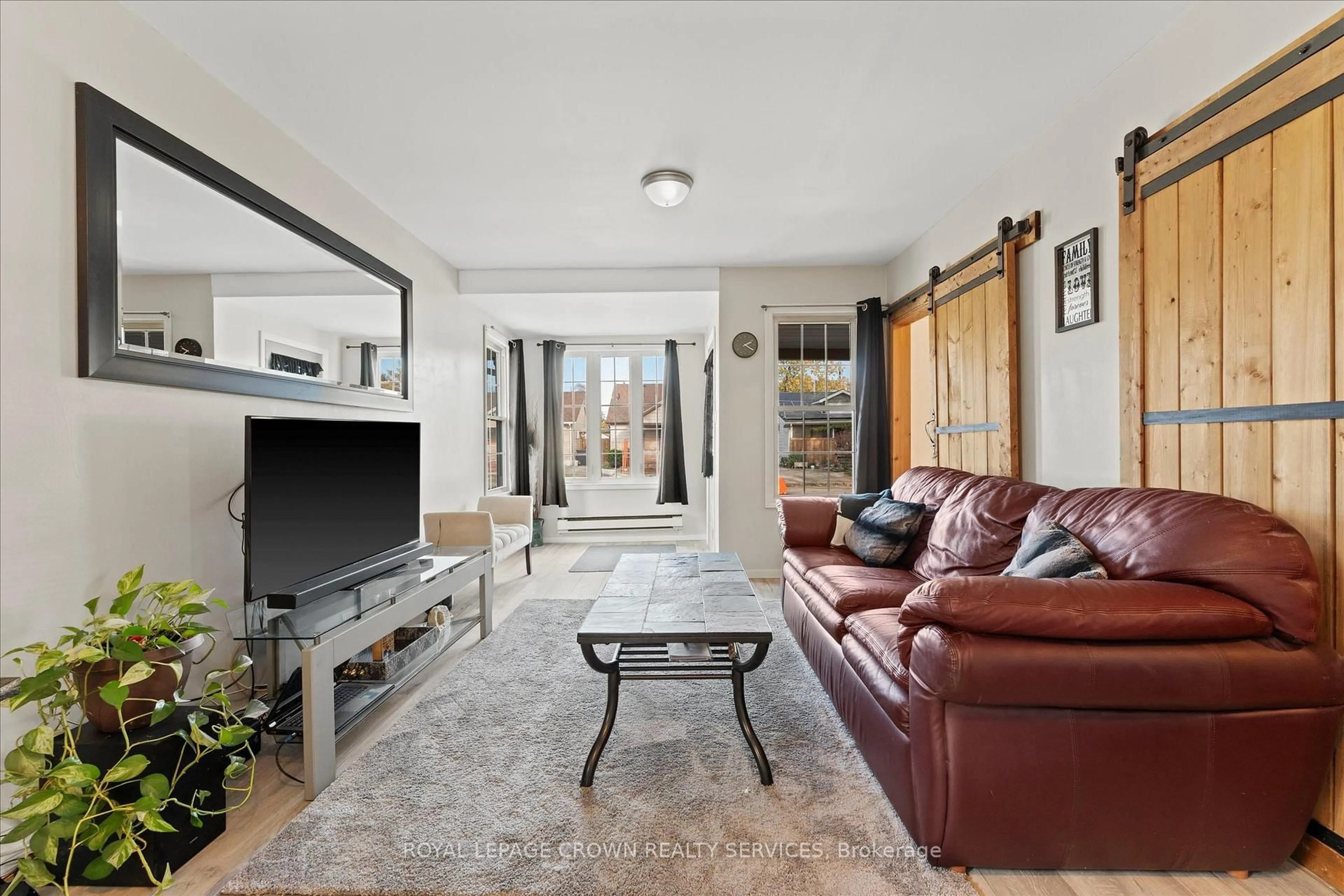 Living room with furniture, ceramic/tile floor for 1743 St Luke Rd, Windsor Ontario N8Y 3N7