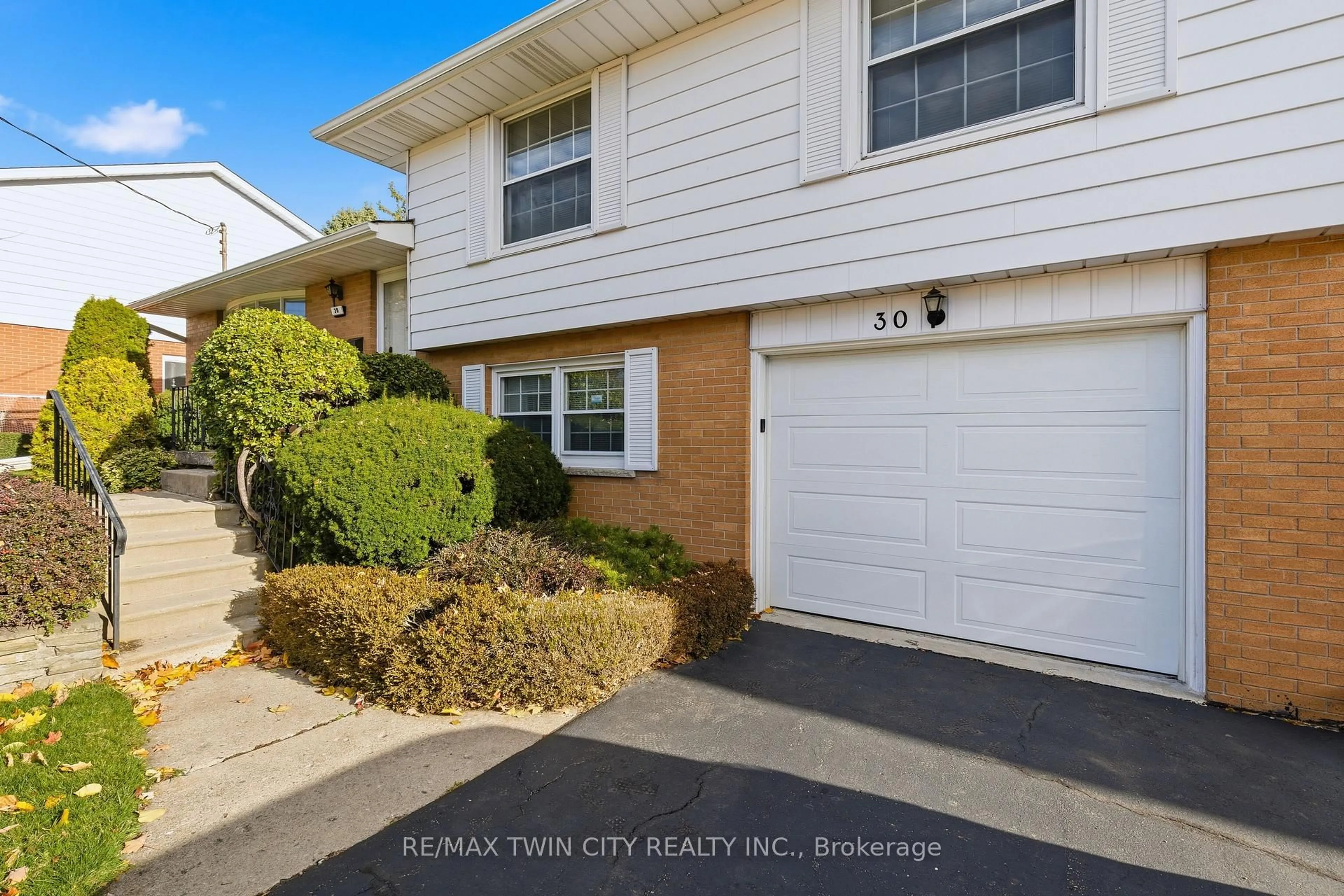 Home with vinyl exterior material, street for 30 Thornridge Cres, Kitchener Ontario N2M 4W1