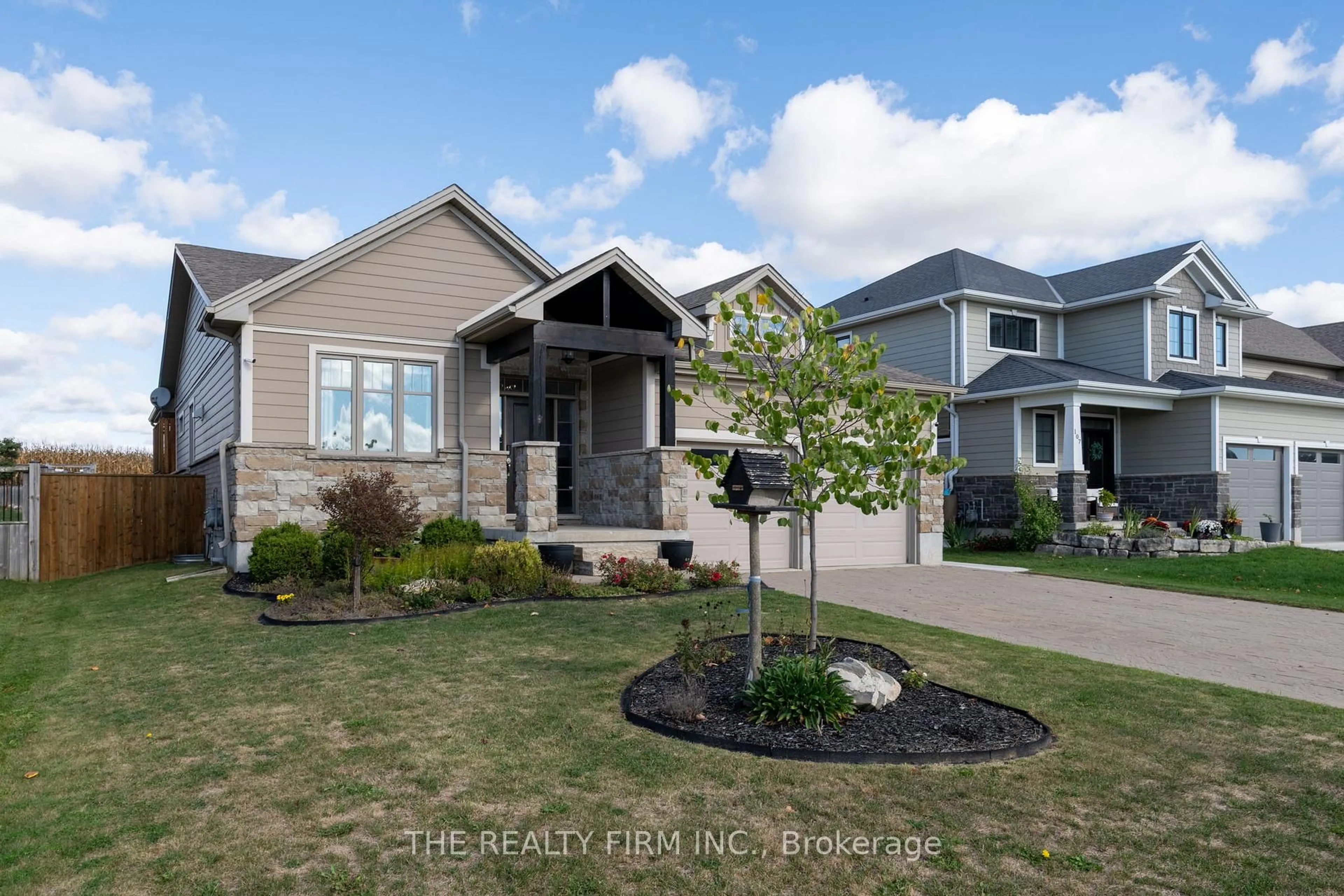 Home with vinyl exterior material, street for 103 Leesboro Tr, Thames Centre Ontario N0M 2P0