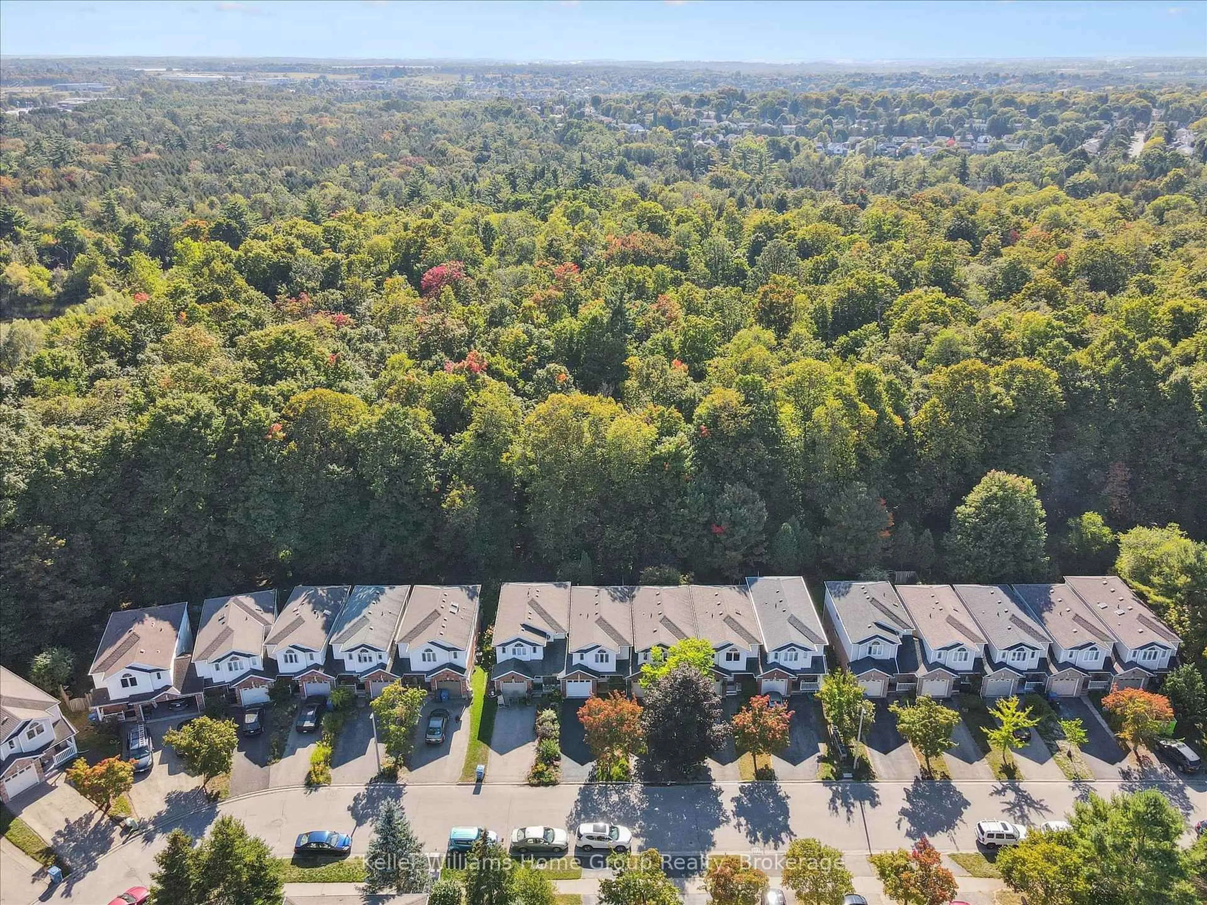 A pic from outside/outdoor area/front of a property/back of a property/a pic from drone, forest/trees view for 97 Rodgers Rd, Guelph Ontario N1G 4Z6