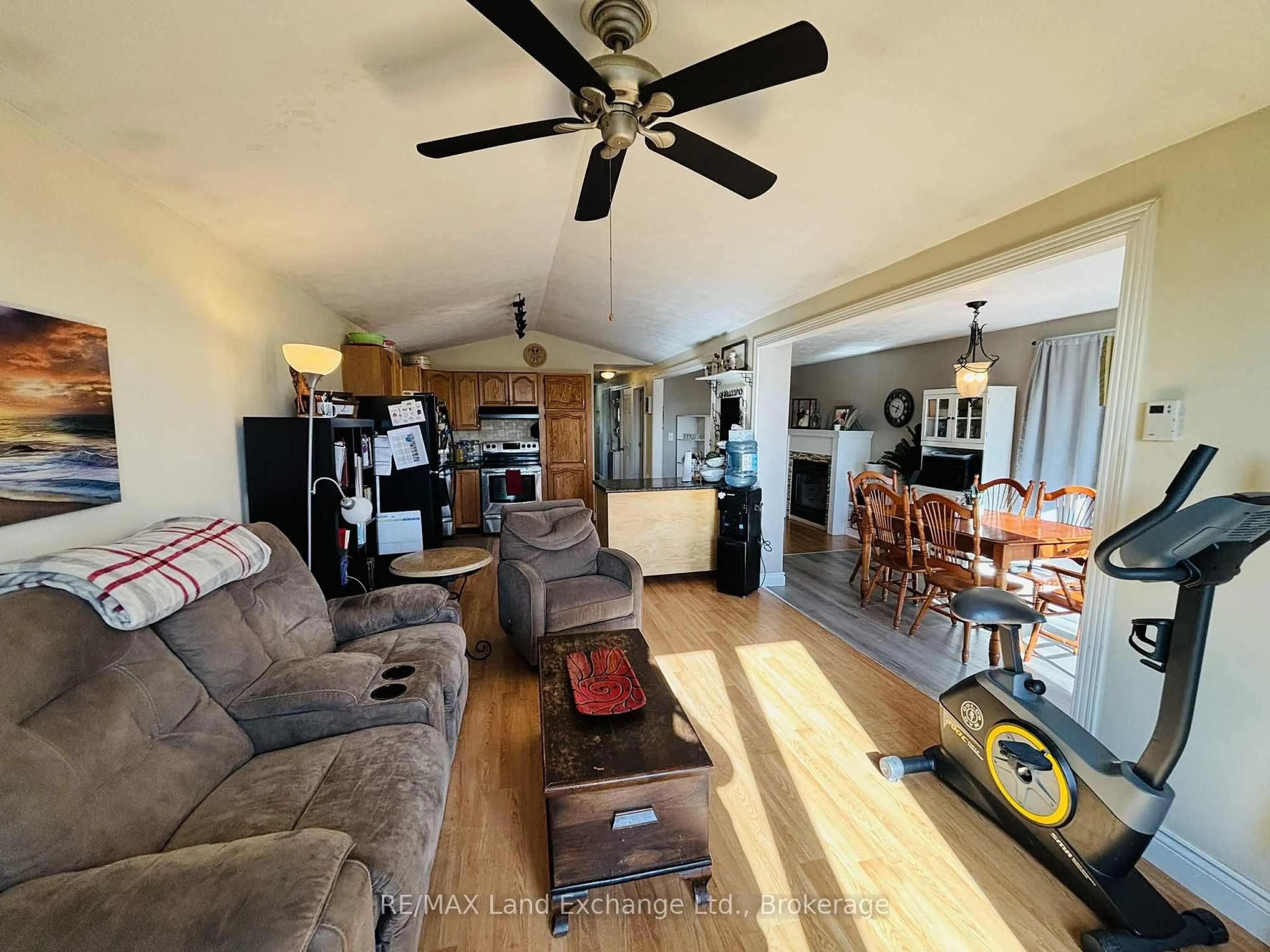 Living room with furniture, wood/laminate floor for 206 Grace St, Georgian Bluffs Ontario N0H 2N0