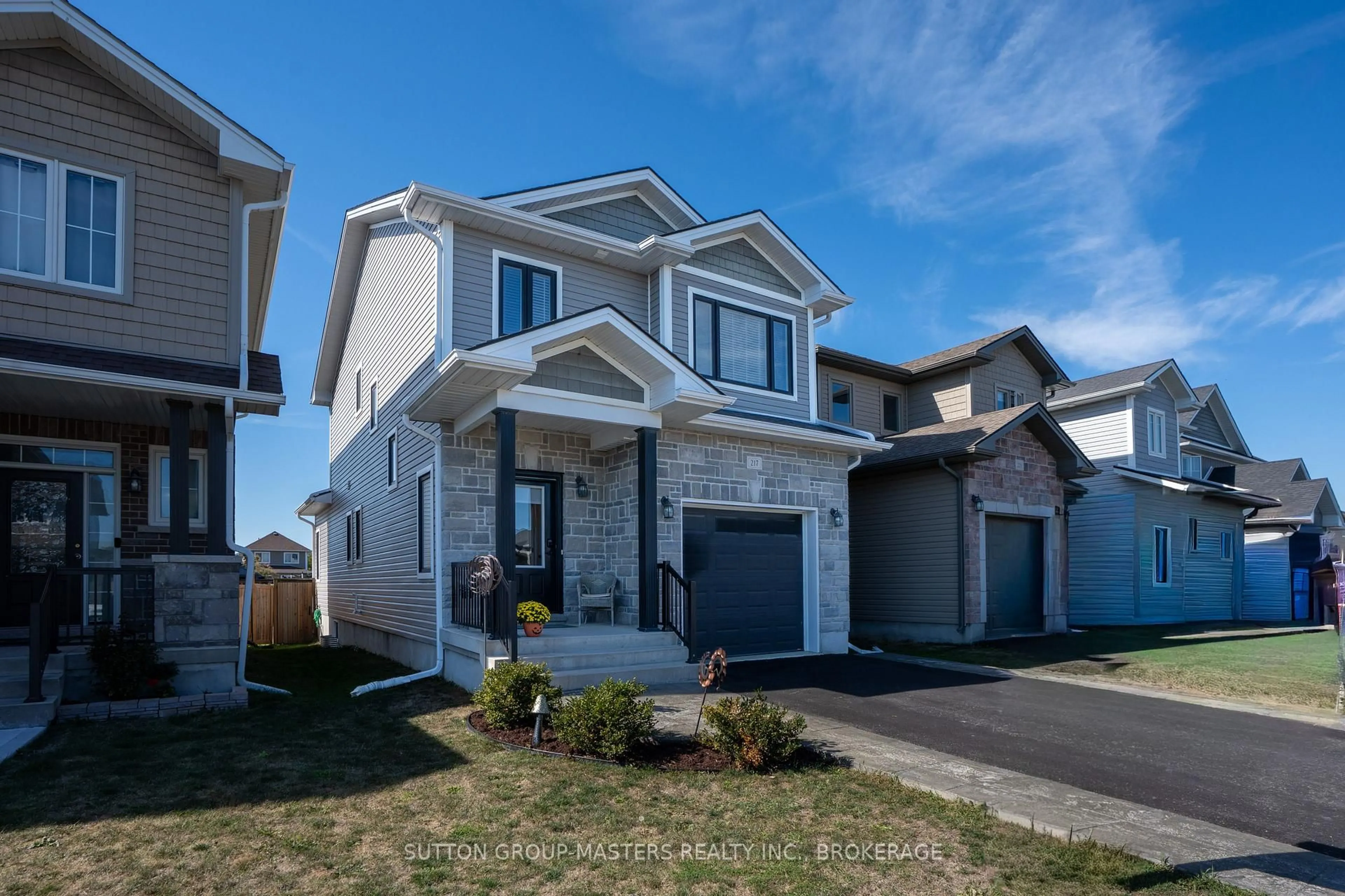 Home with vinyl exterior material, street for 217 Holden St, Kingston Ontario K7P 0L1