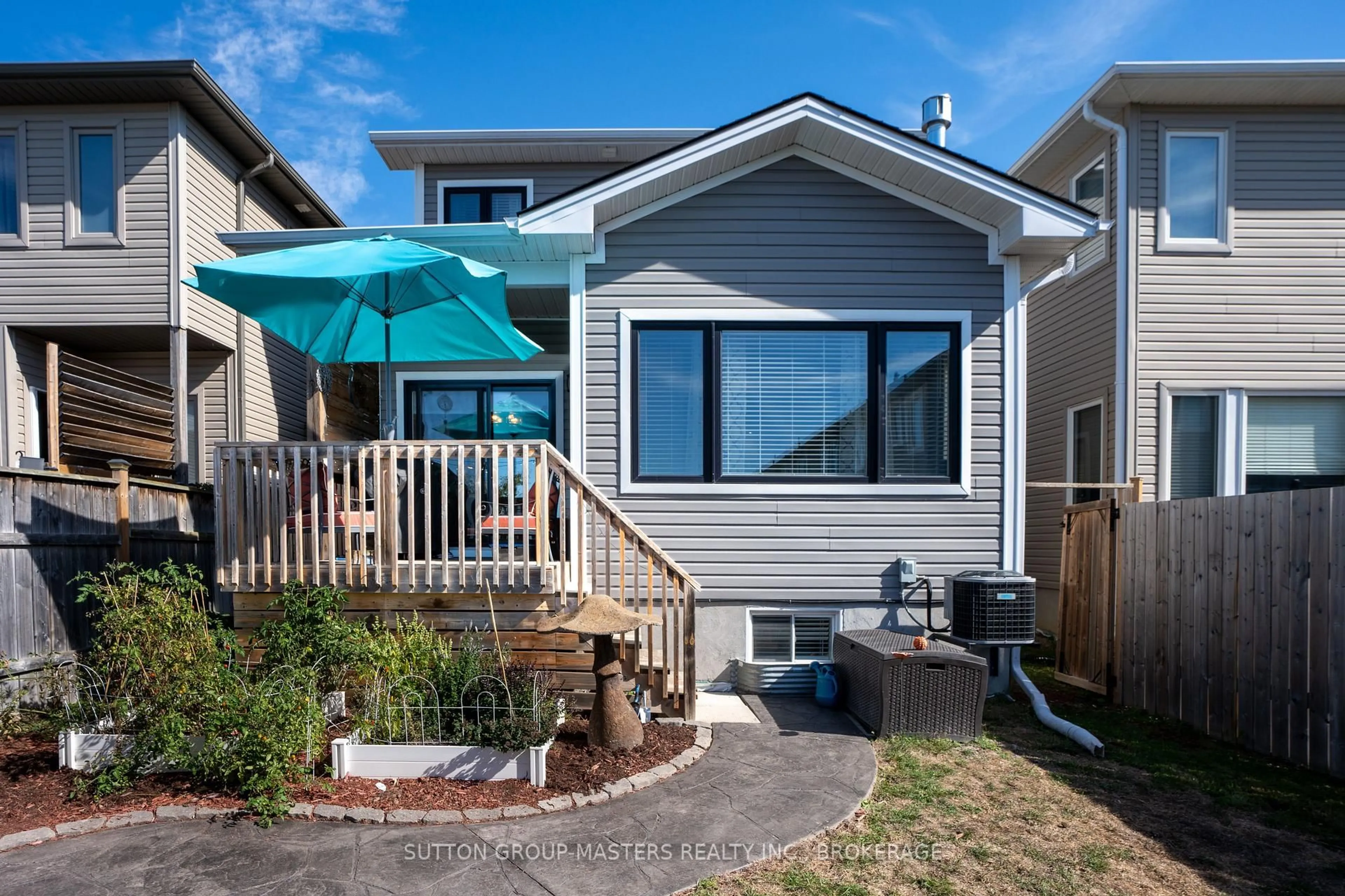 Home with vinyl exterior material, street for 217 Holden St, Kingston Ontario K7P 0L1