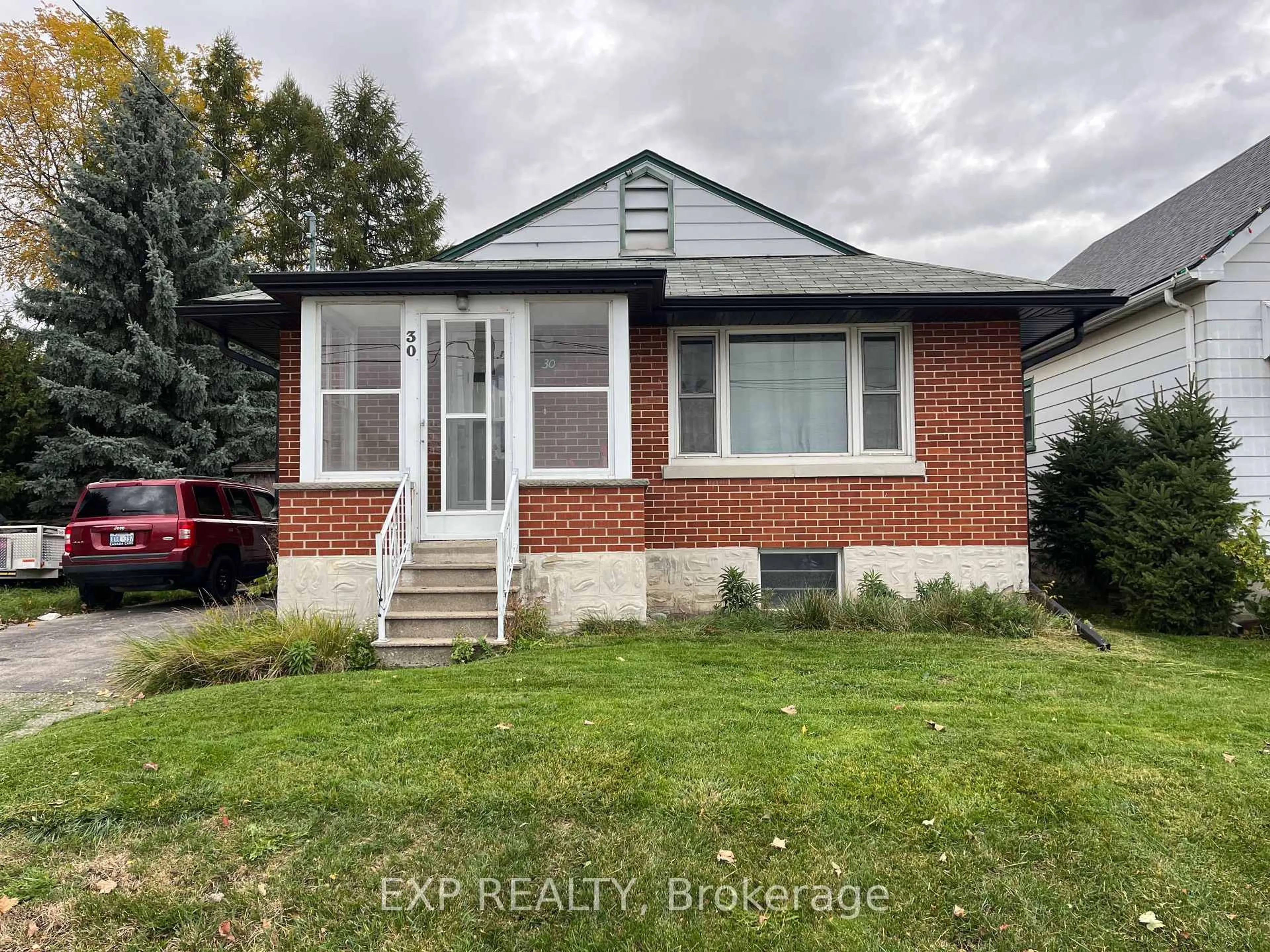 Home with brick exterior material, street for 30 Stewart St, Kitchener Ontario N2G 2E4
