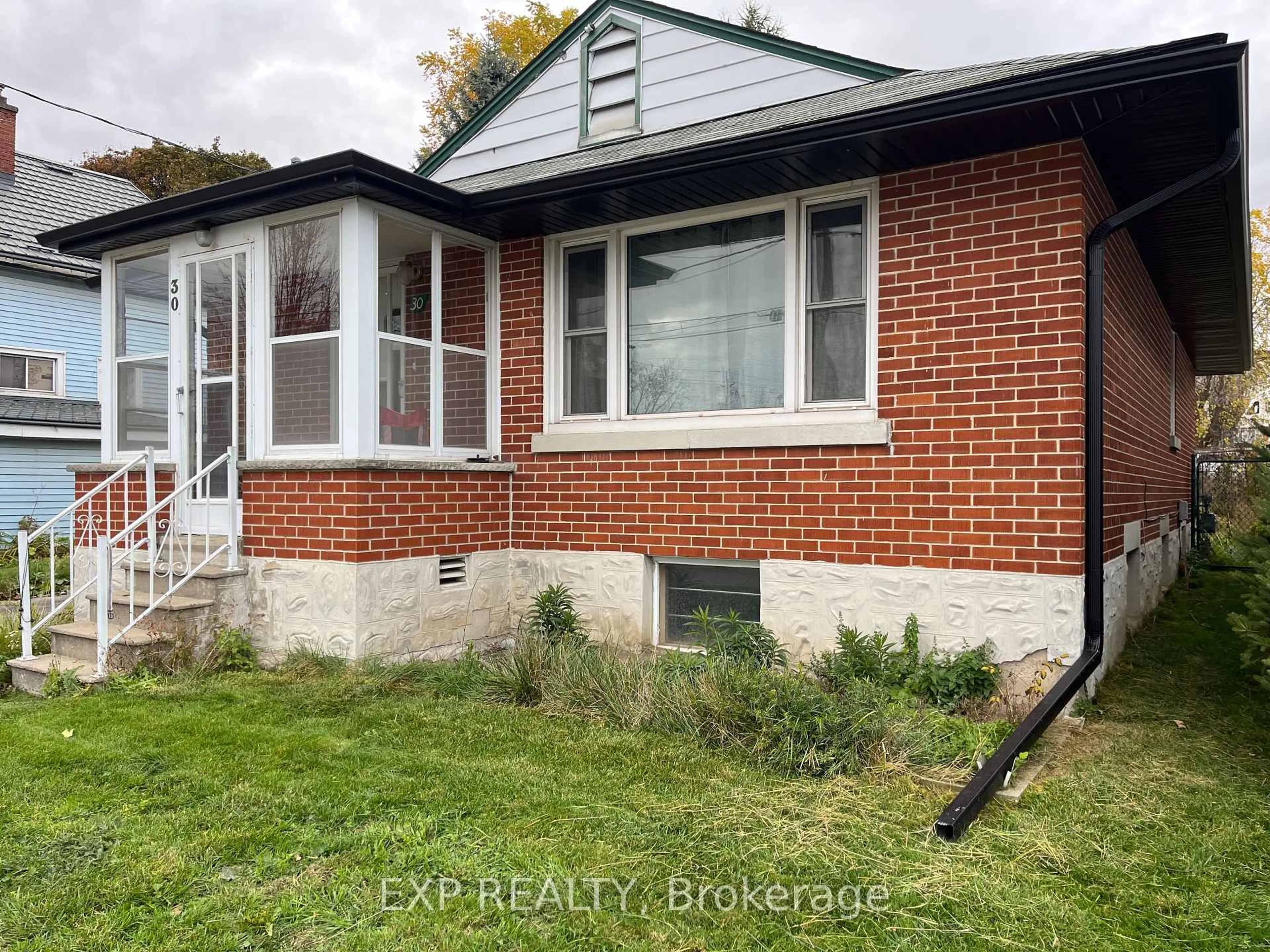 Home with brick exterior material, street for 30 Stewart St, Kitchener Ontario N2G 2E4
