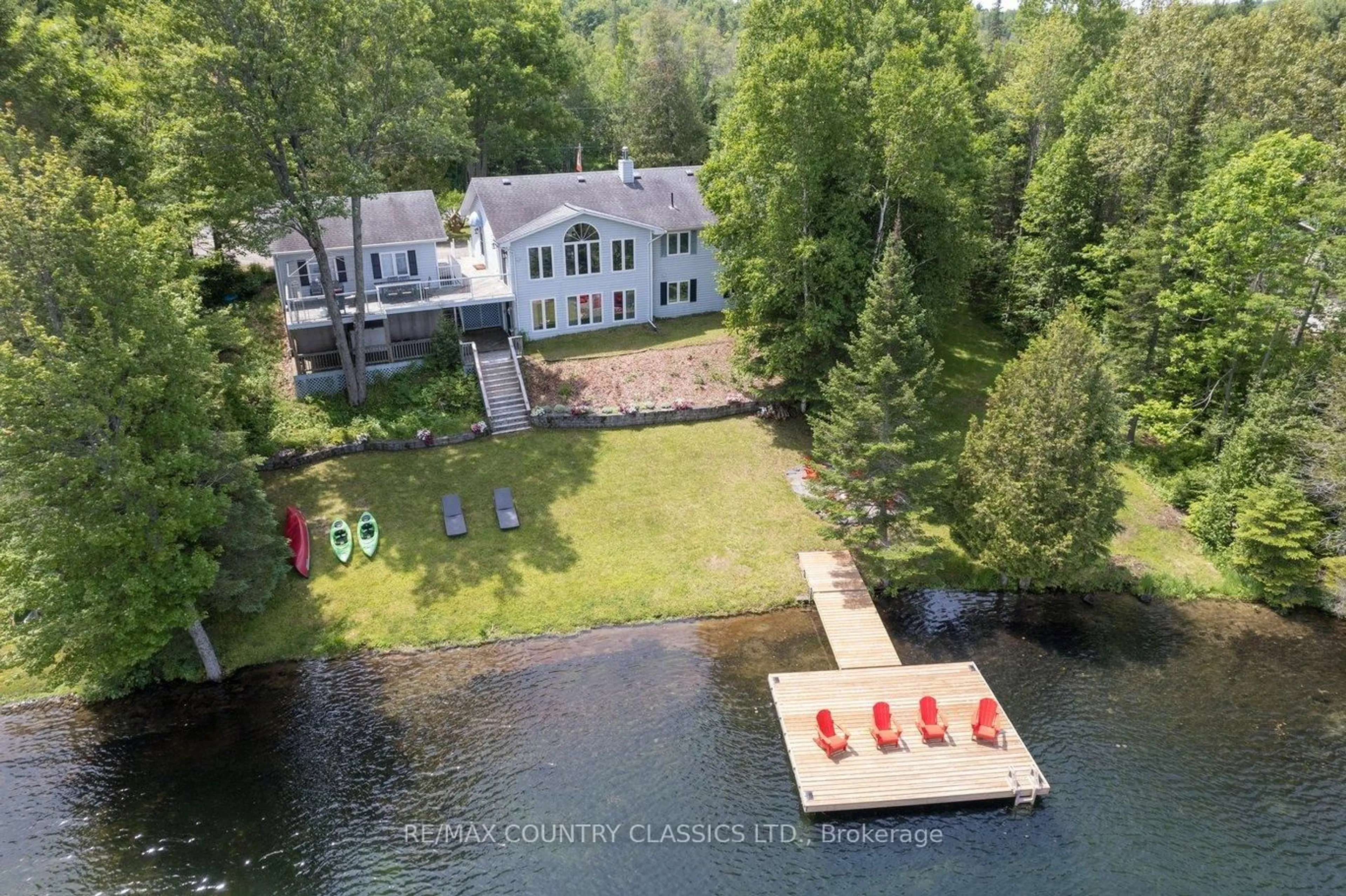 A pic from outside/outdoor area/front of a property/back of a property/a pic from drone, water/lake/river/ocean view for 112 Bay Shore Dr, Bancroft Ontario K0L 1C0