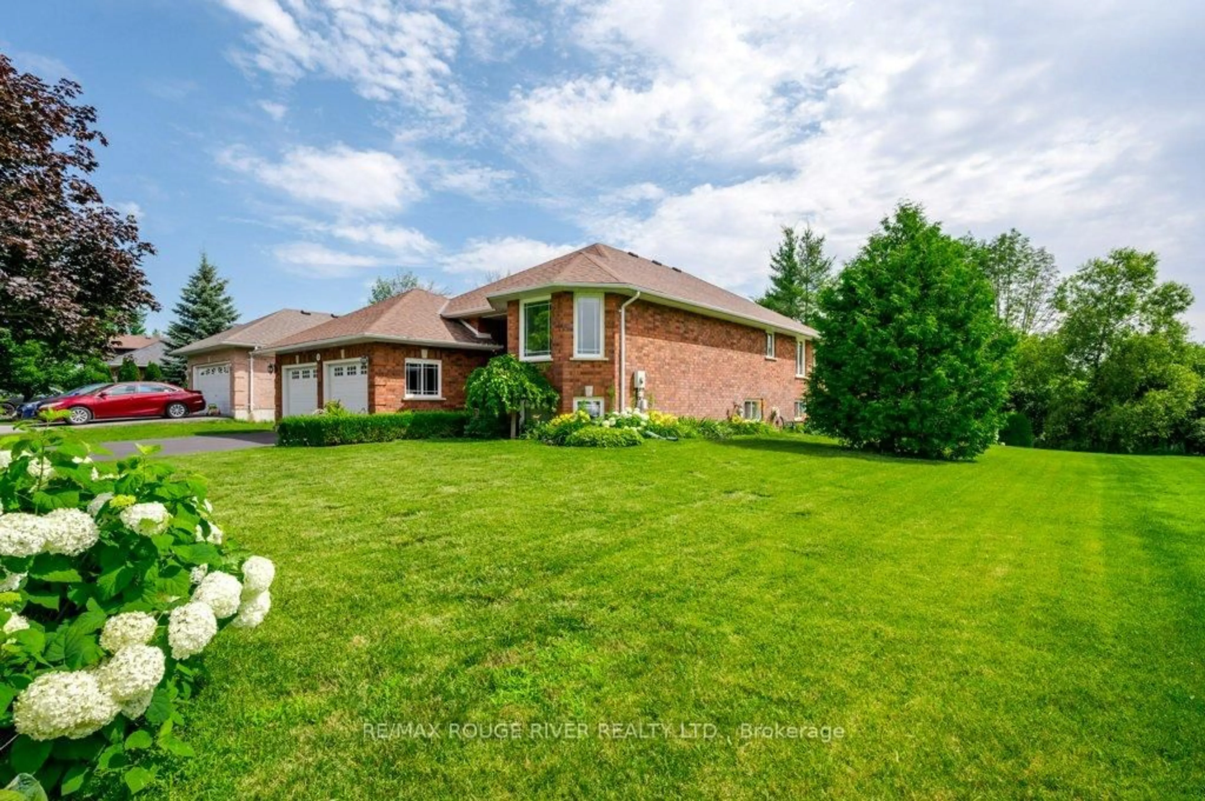 A pic from outside/outdoor area/front of a property/back of a property/a pic from drone, water/lake/river/ocean view for 315 Woodward Ave, Selwyn Ontario K9L 1K2