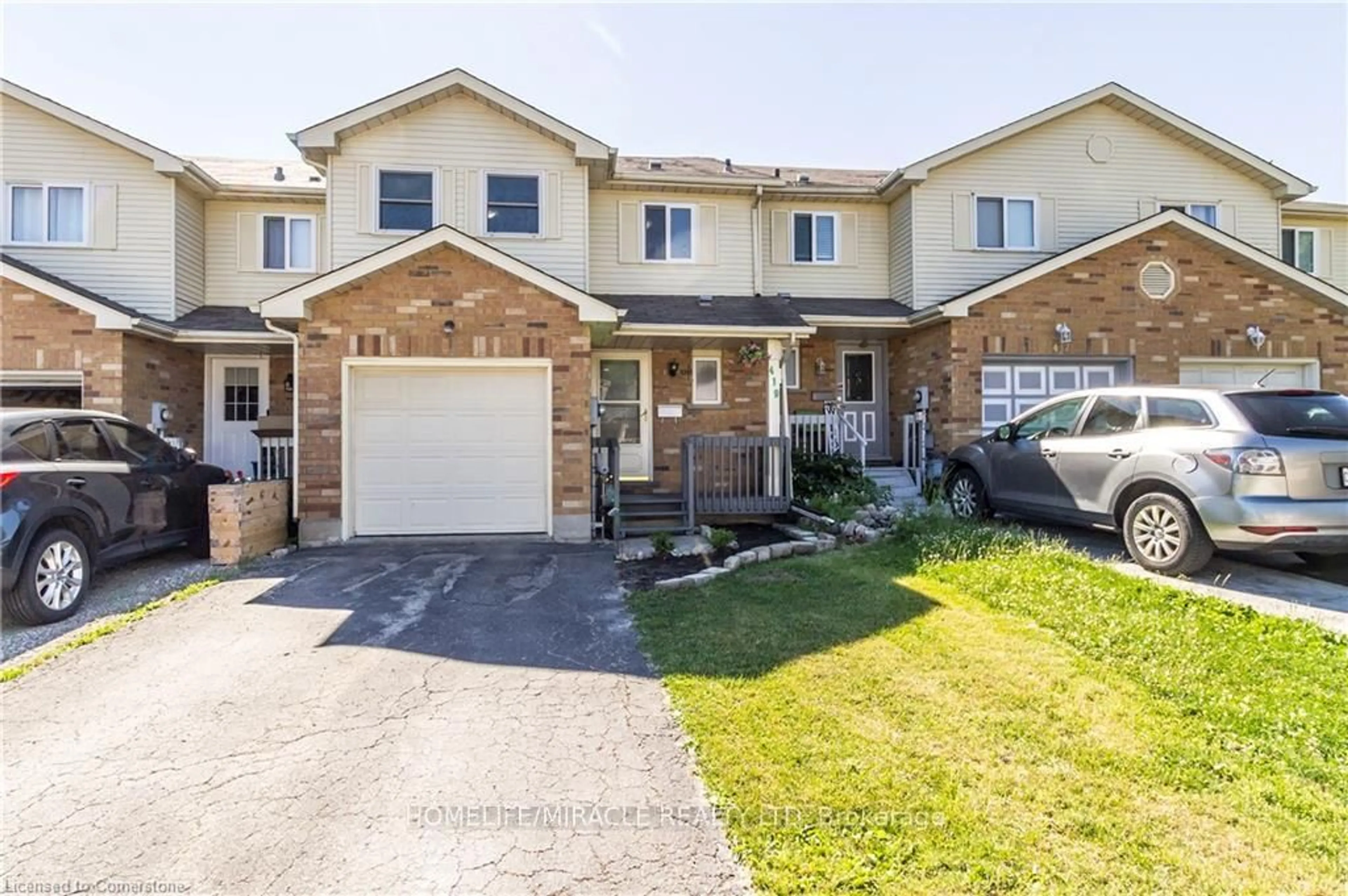 Home with brick exterior material, street for 419 Downsview Pl, Waterloo Ontario N2K 3T9