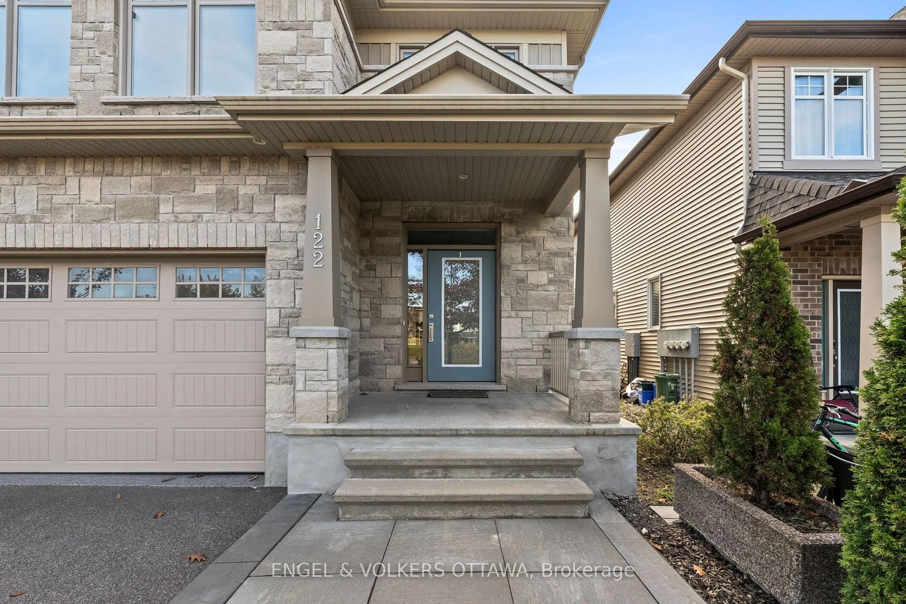 Home with brick exterior material, street for 122 Helen Rapp Way, Ottawa Ontario K1T 0N4