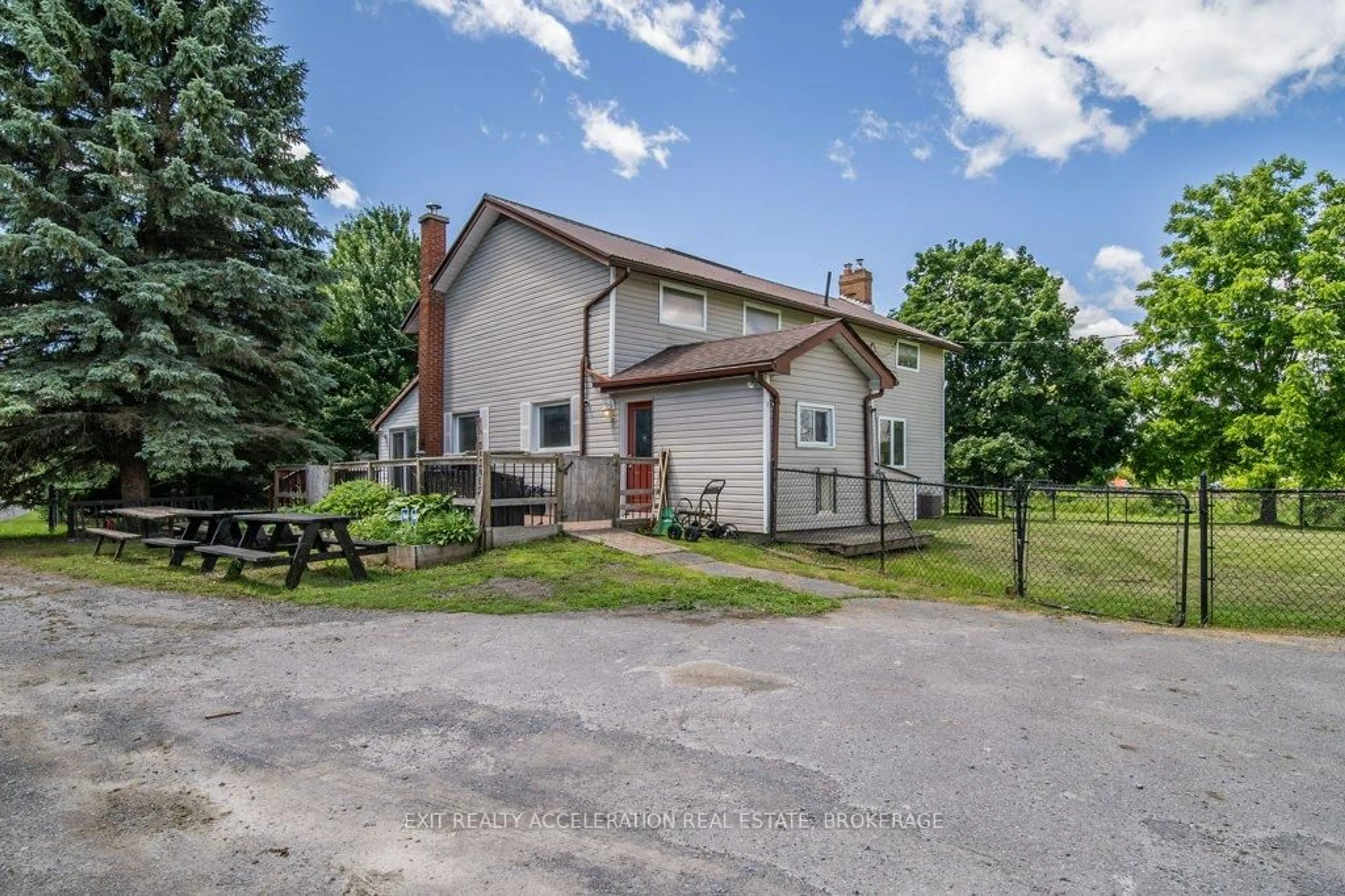 A pic from outside/outdoor area/front of a property/back of a property/a pic from drone, unknown for 8061 County Rd 2, Greater Napanee Ontario K0K 2W0