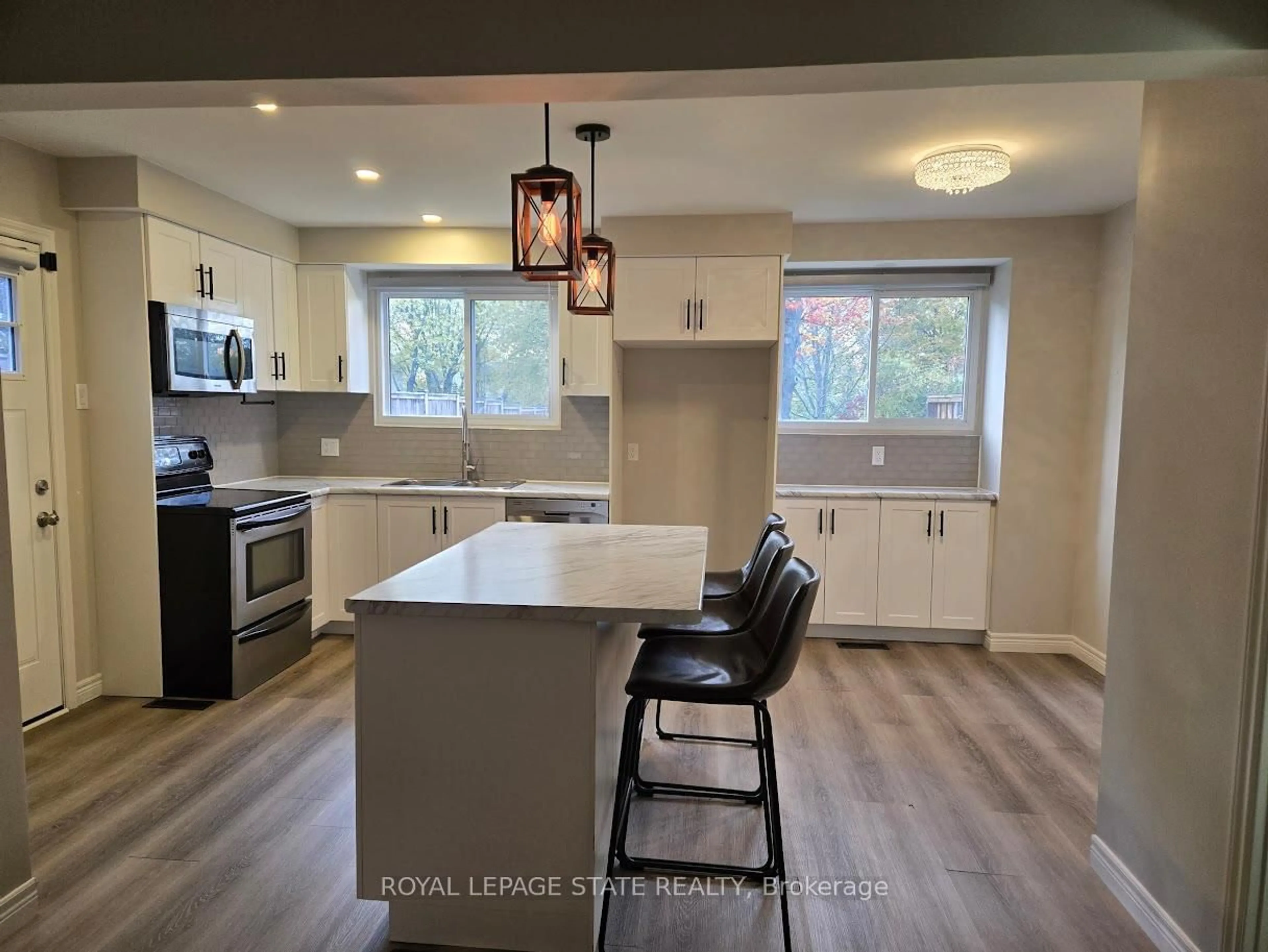 Open concept kitchen, unknown for 74 Silvan Dr, Welland Ontario L3C 6C3
