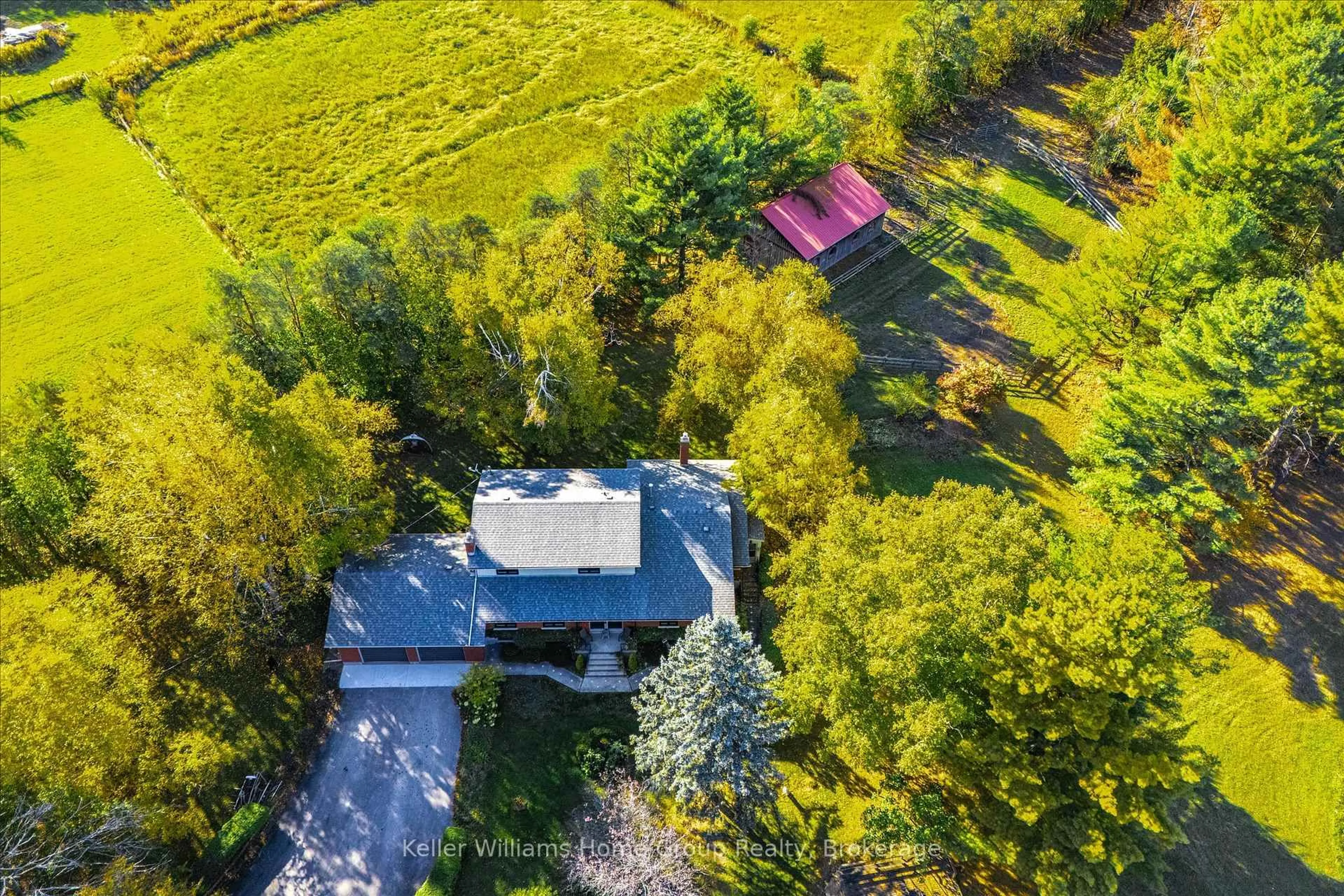 A pic from outside/outdoor area/front of a property/back of a property/a pic from drone, forest/trees view for 7828 Sixth Line, Centre Wellington Ontario N0B 1S0