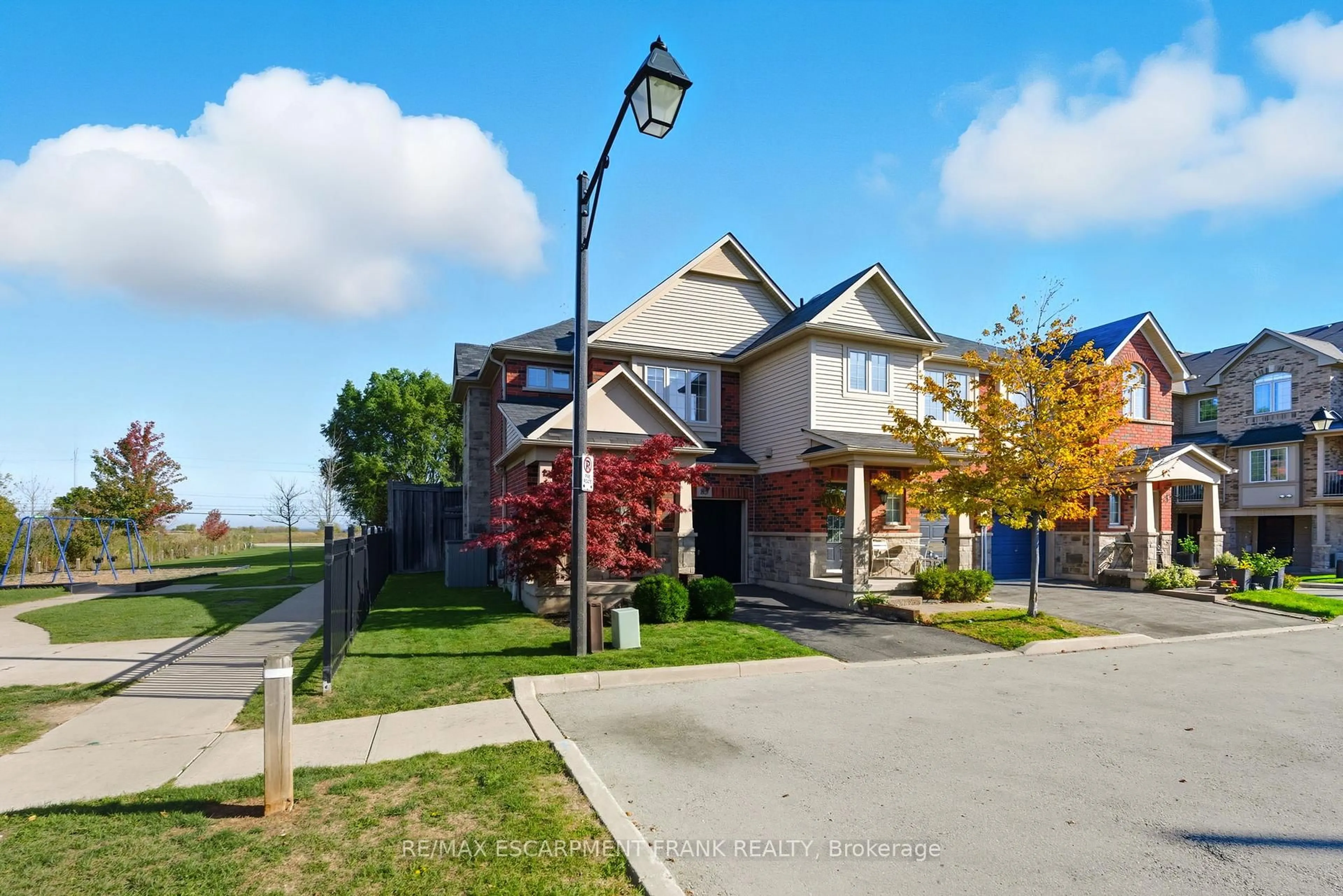 A pic from outside/outdoor area/front of a property/back of a property/a pic from drone, street for 541 Winston Rd #85, Grimsby Ontario L3M 0C5