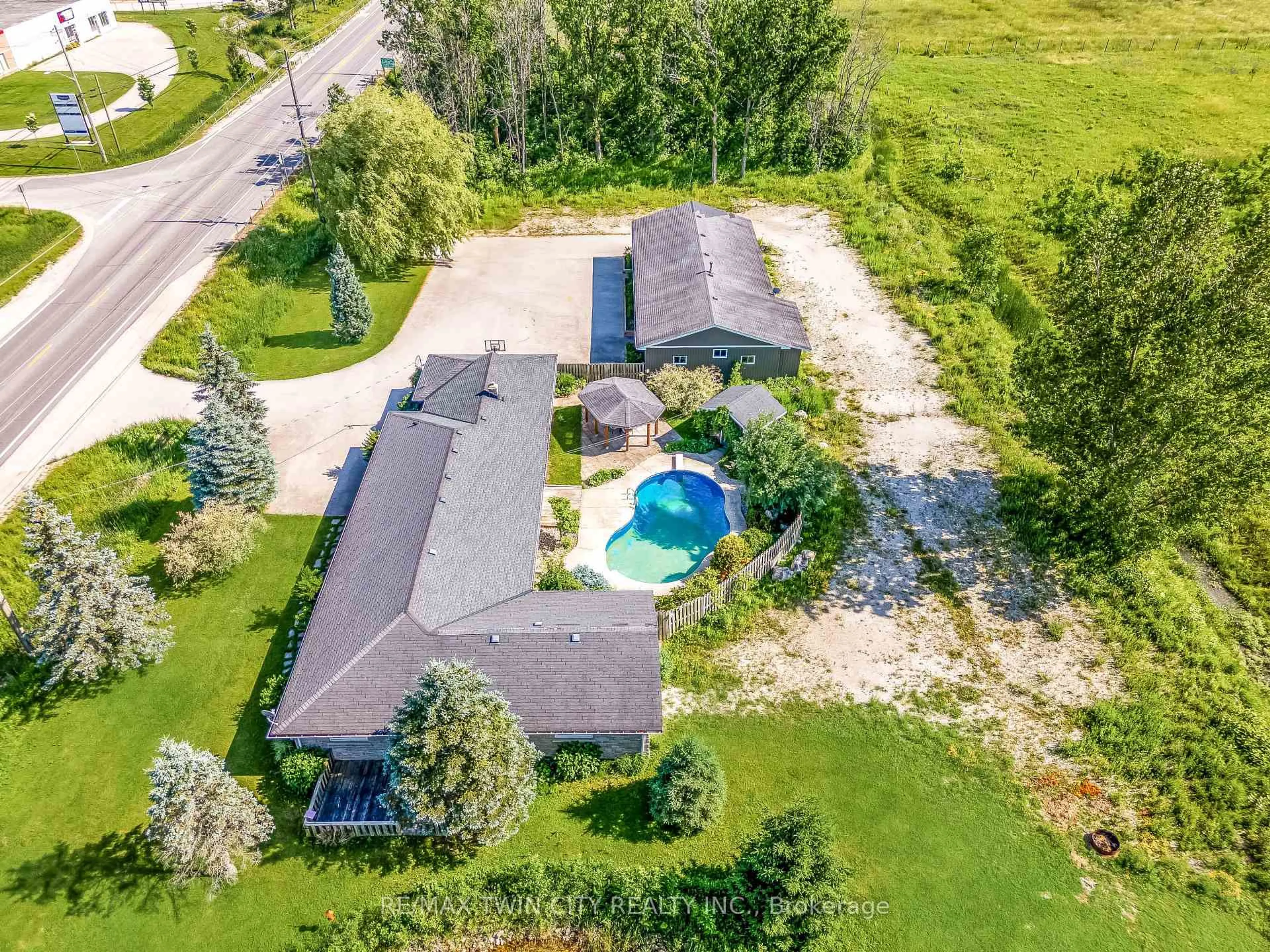 A pic from outside/outdoor area/front of a property/back of a property/a pic from drone, water/lake/river/ocean view for 717906 HIGHWAY 6, Georgian Bluffs Ontario N4K 5N7