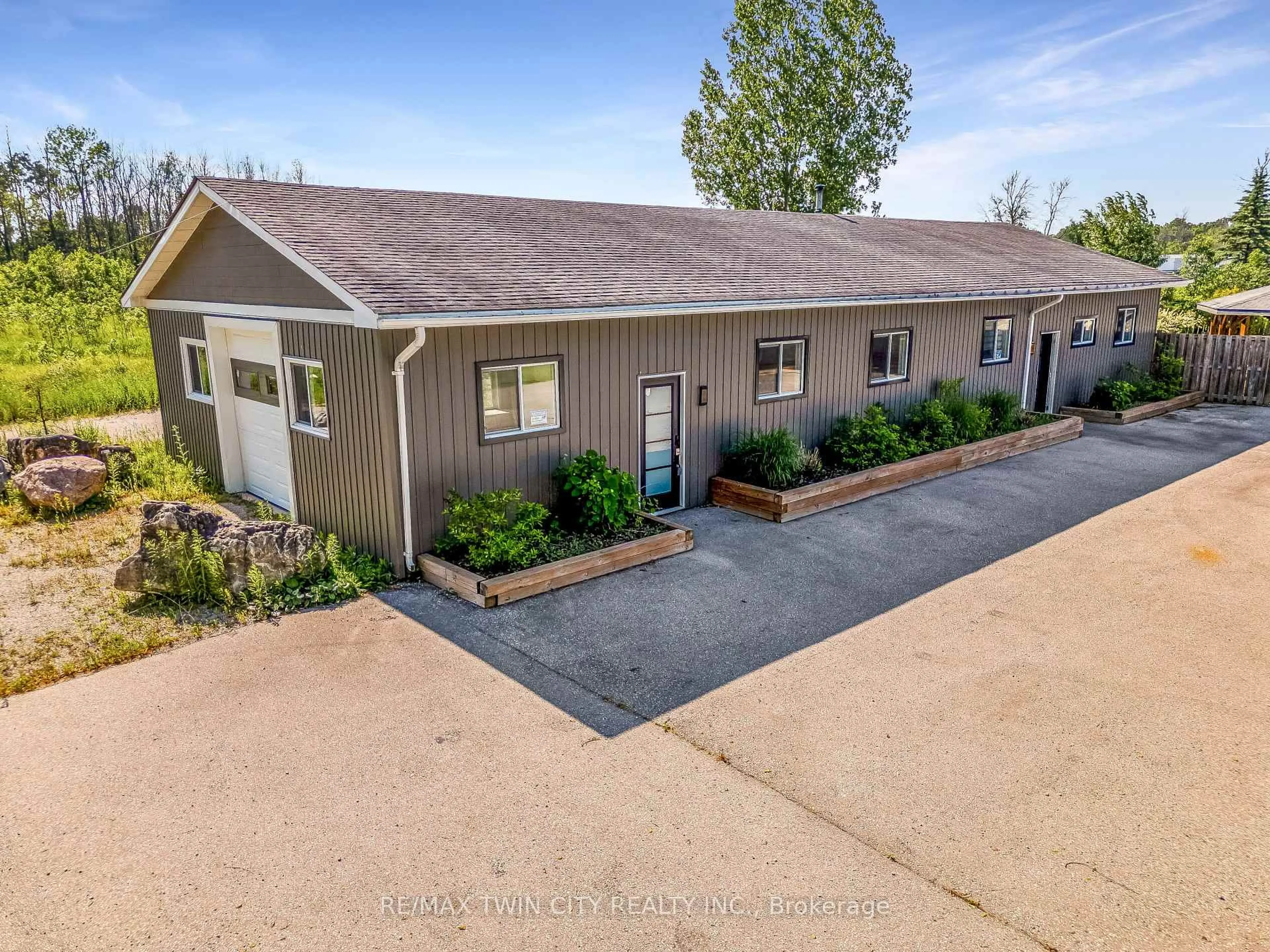 A pic from outside/outdoor area/front of a property/back of a property/a pic from drone, building for 717906 HIGHWAY 6, Georgian Bluffs Ontario N4K 5N7