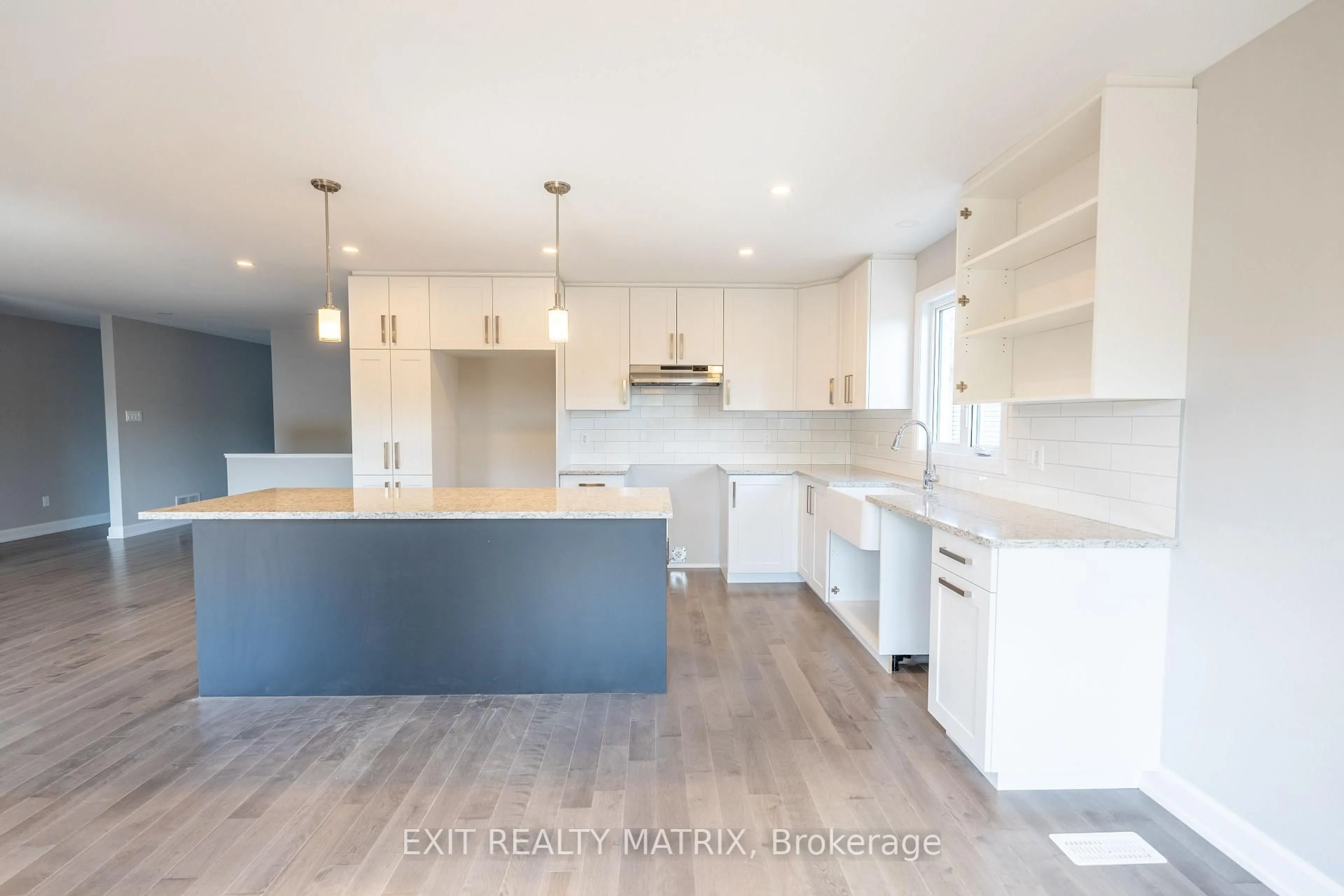Open concept kitchen, wood/laminate floor for 6 Glenco Rd, South Stormont Ontario K0C 2A0