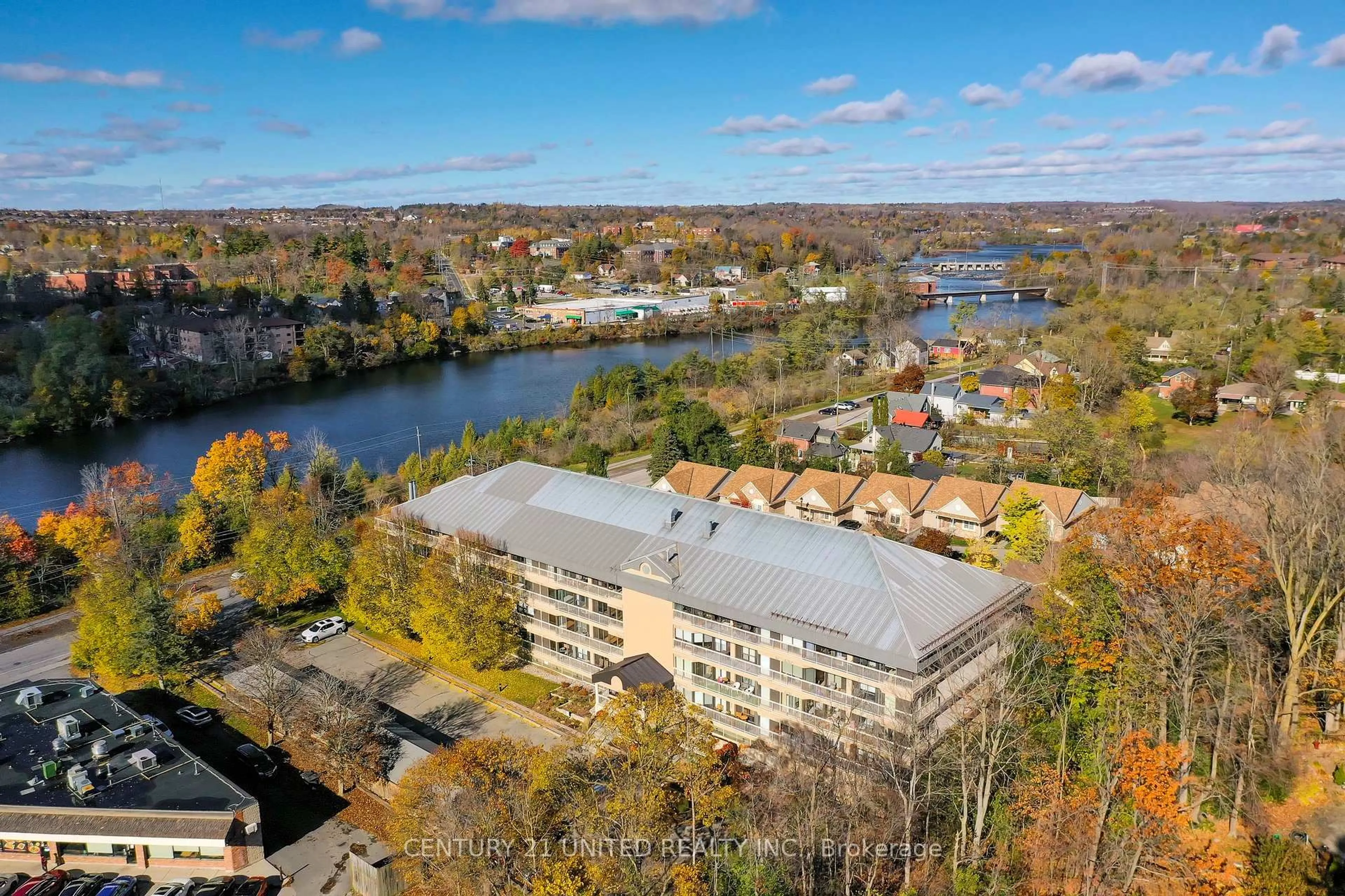 A pic from outside/outdoor area/front of a property/back of a property/a pic from drone, water/lake/river/ocean view for 40 Auburn St #208, Peterborough Ontario K9H 2G2