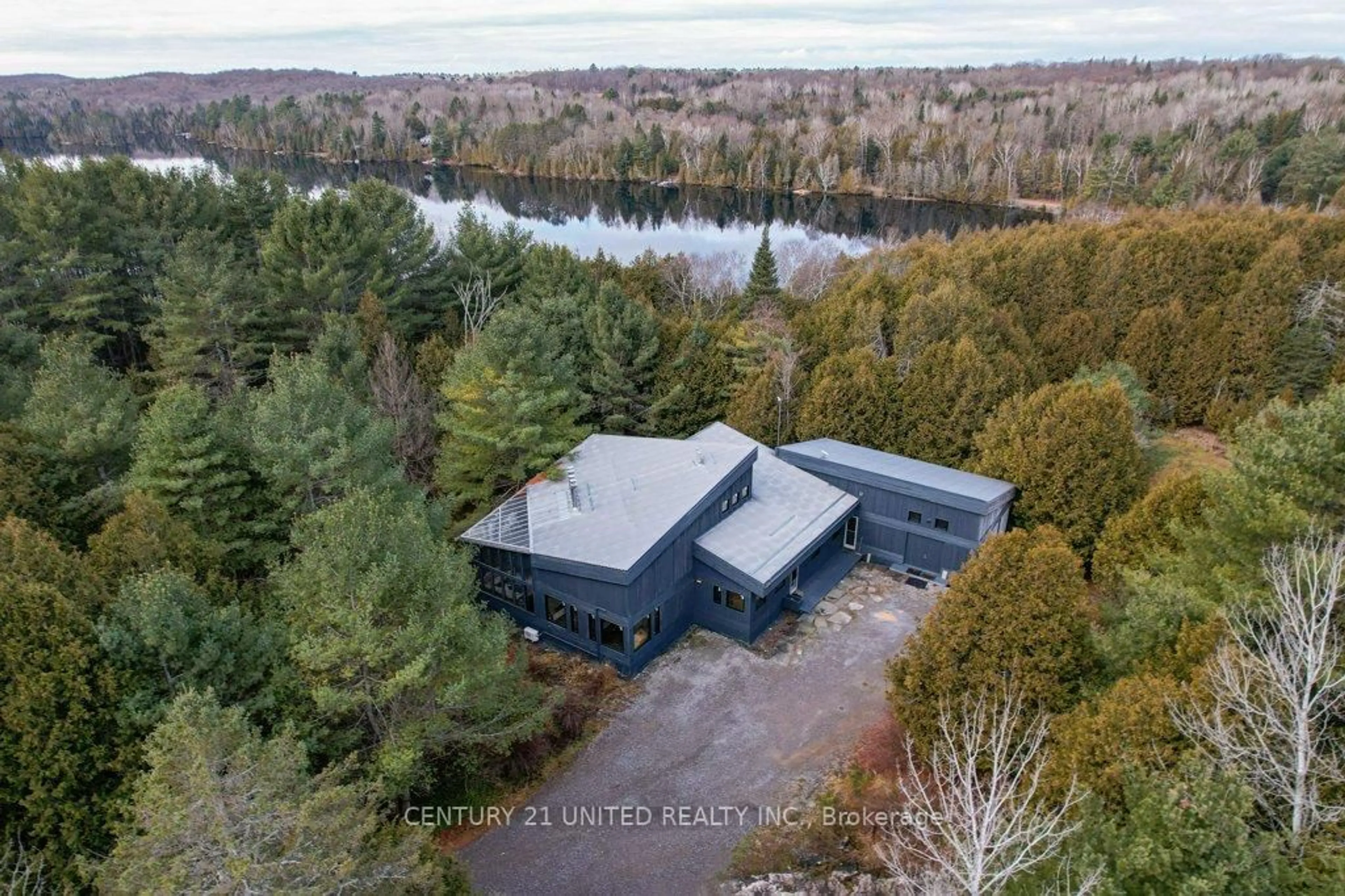 A pic from outside/outdoor area/front of a property/back of a property/a pic from drone, water/lake/river/ocean view for 1080 Clydesdale Rd, North Kawartha Ontario K0L 1A0