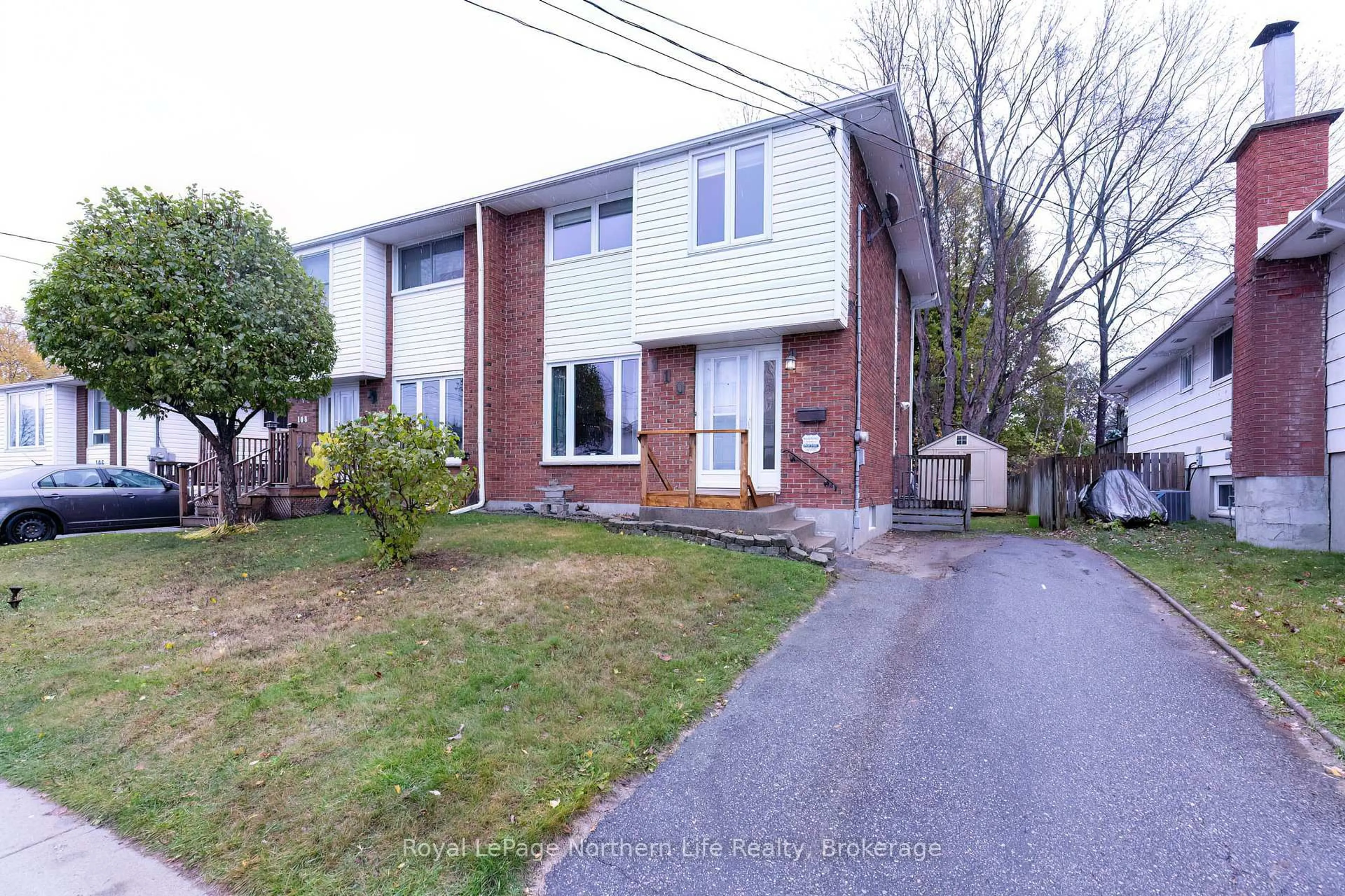 A pic from outside/outdoor area/front of a property/back of a property/a pic from drone, street for 110 Marshall Park Dr, North Bay Ontario P1A 3L2