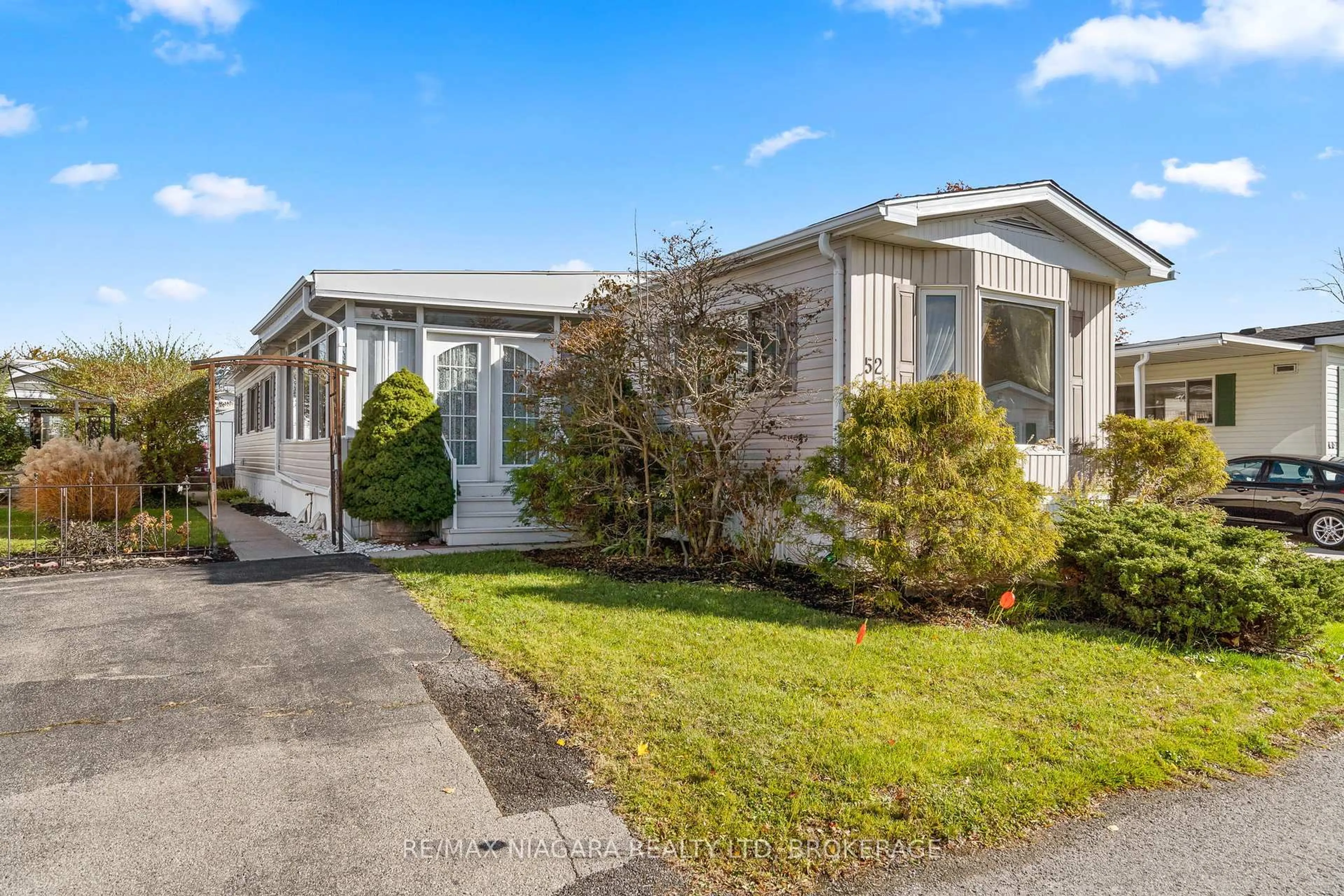 Home with vinyl exterior material, street for 3033 Townline Rd #52, Fort Erie Ontario L0R 1S0