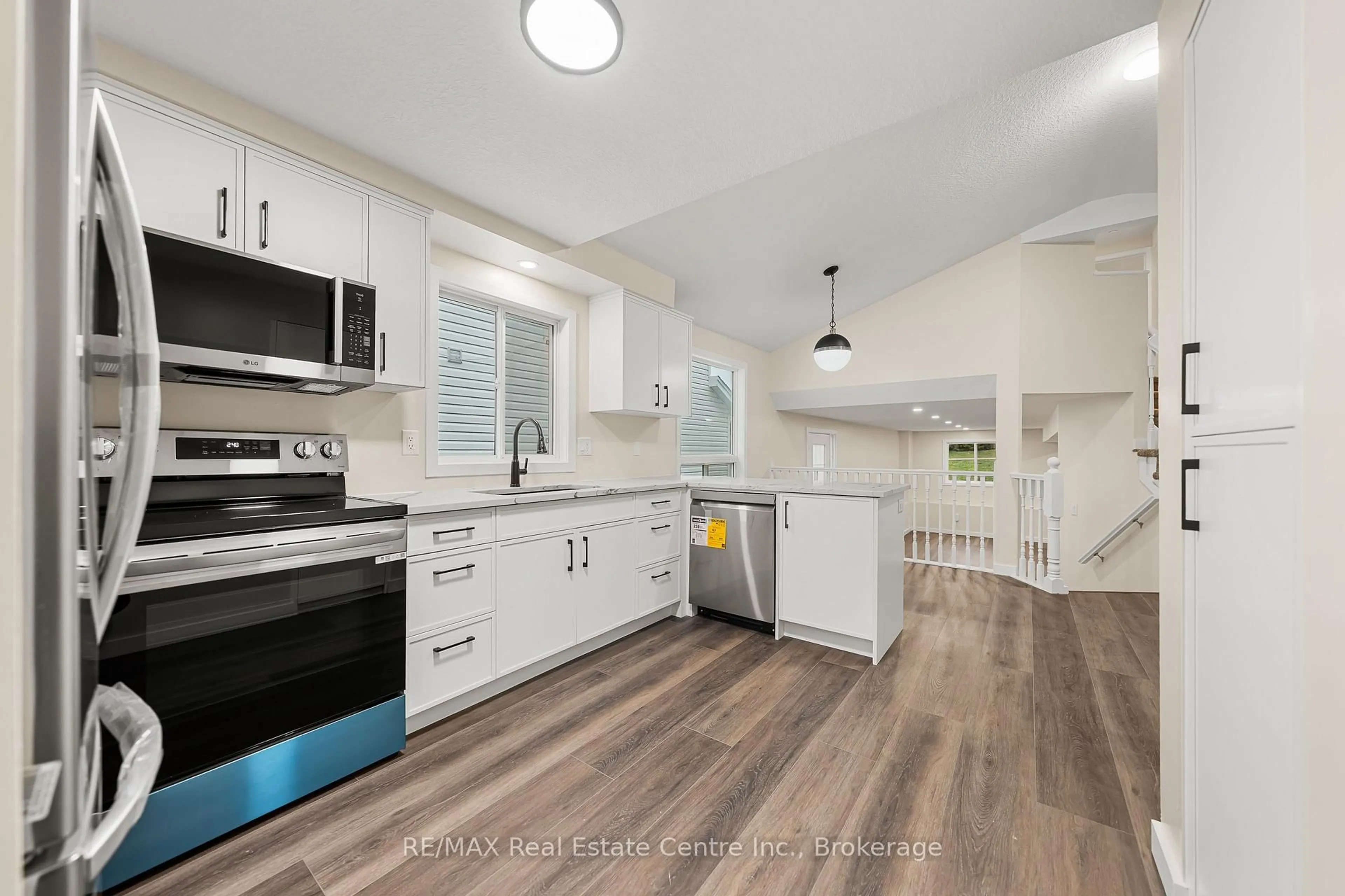 Open concept kitchen, ceramic/tile floor for 716A Karlsfeld Rd, Waterloo Ontario N2T 2W4