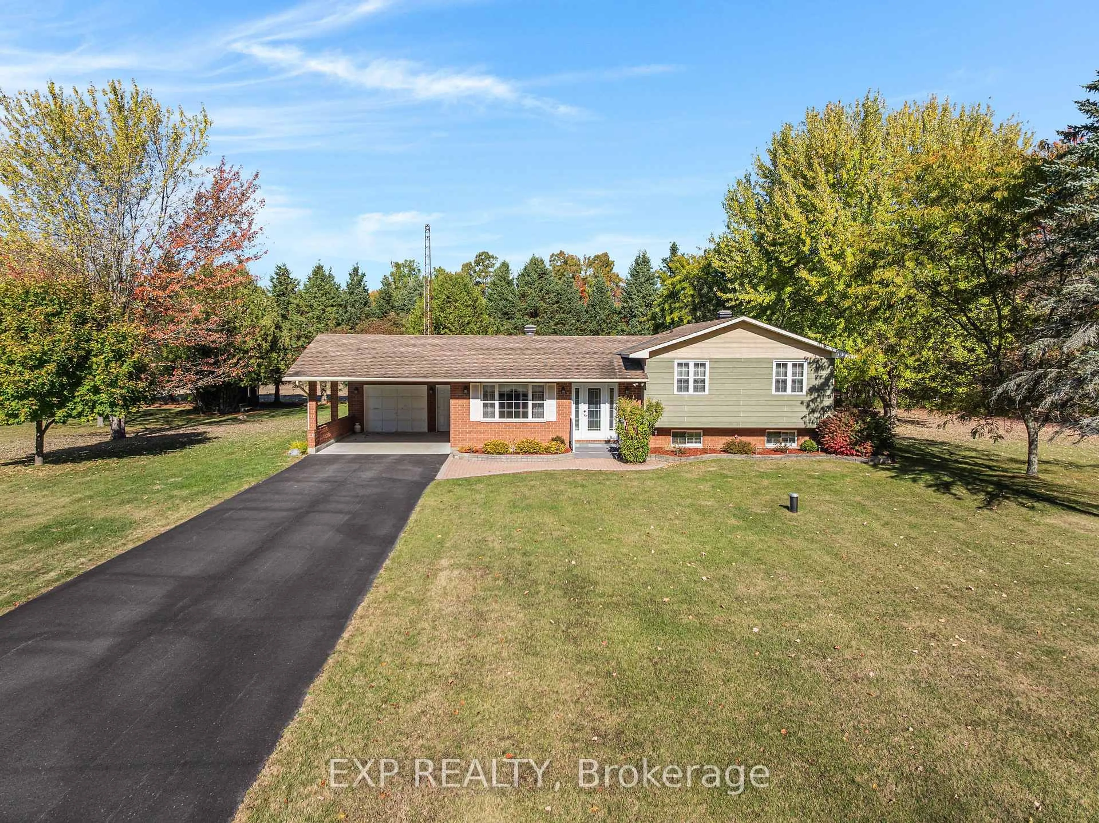 A pic from outside/outdoor area/front of a property/back of a property/a pic from drone, water/lake/river/ocean view for 384 Route 200 Rd, Casselman Ontario K0A 1M0