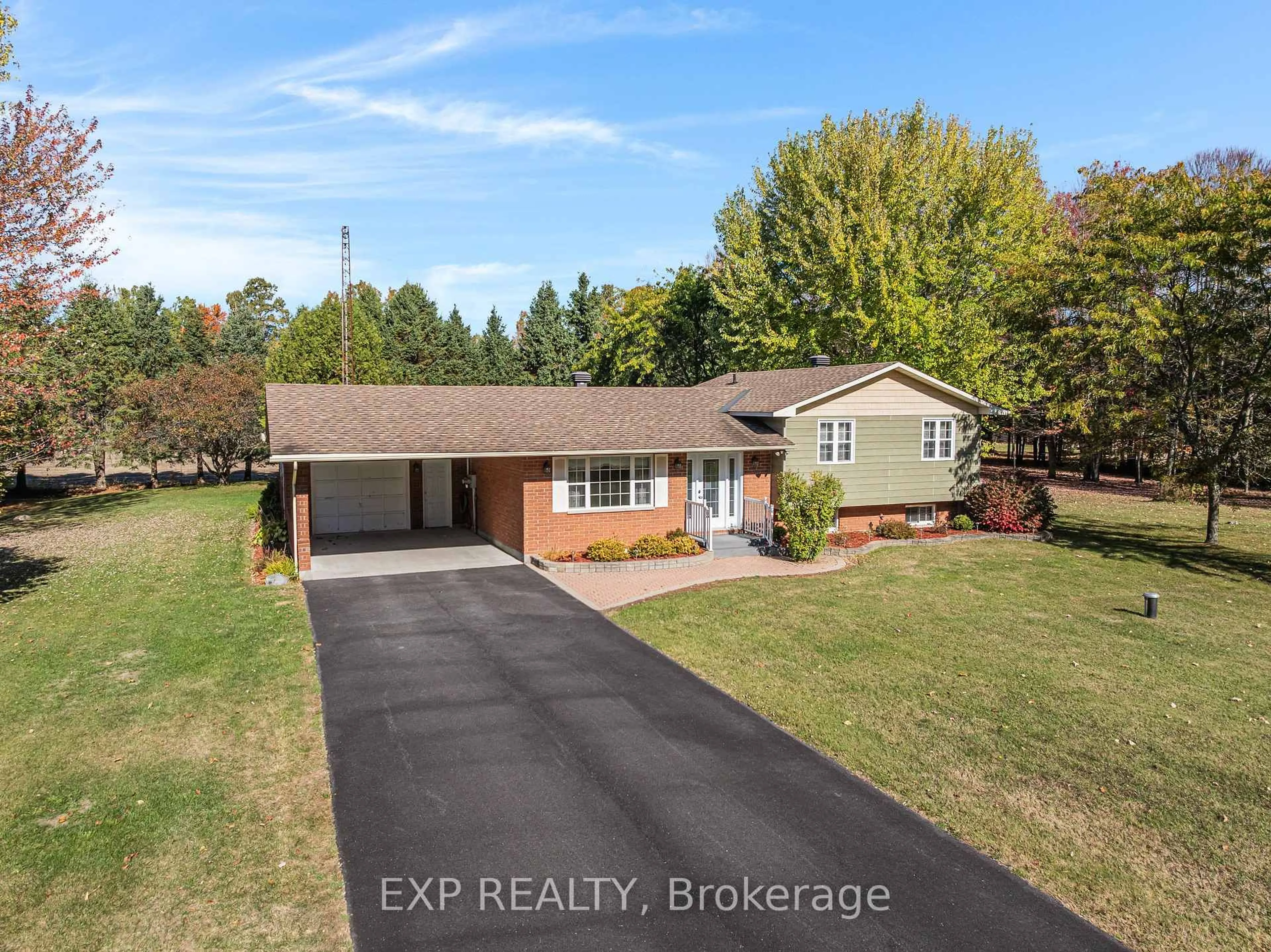 A pic from outside/outdoor area/front of a property/back of a property/a pic from drone, street for 384 Route 200 Rd, Casselman Ontario K0A 1M0