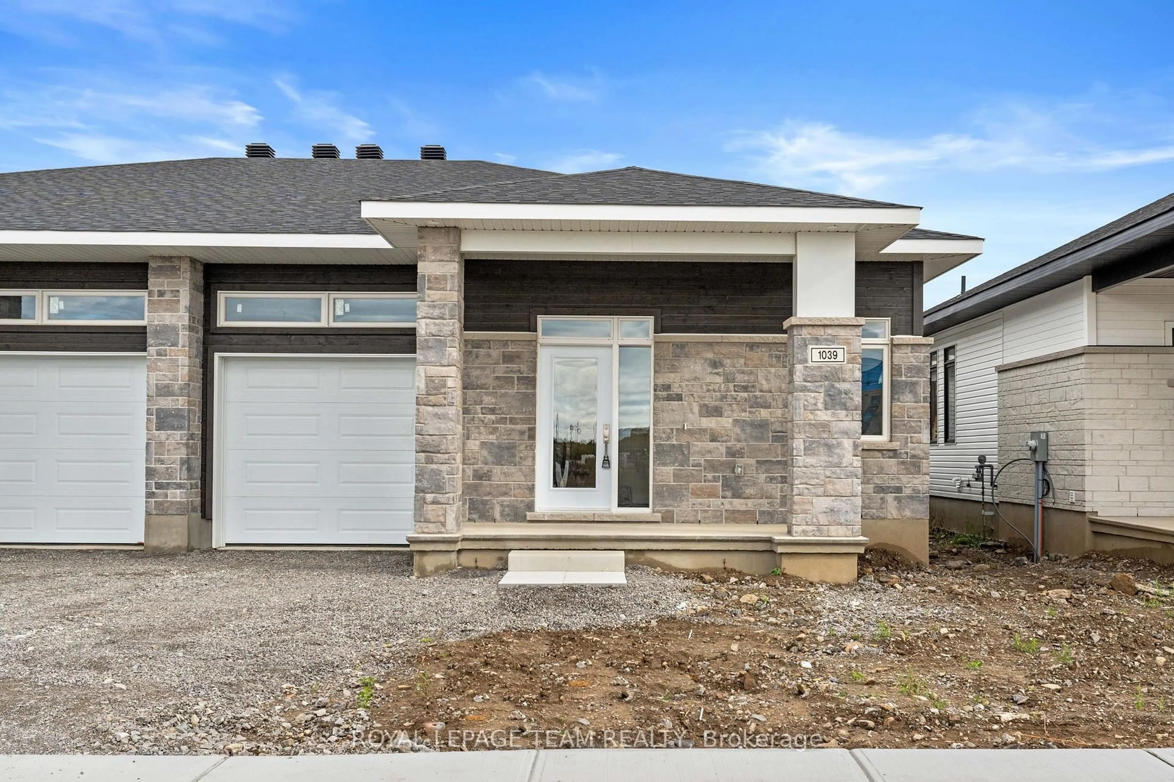 Home with brick exterior material, street for 1039 Moore St, Brockville Ontario K6V 0H1