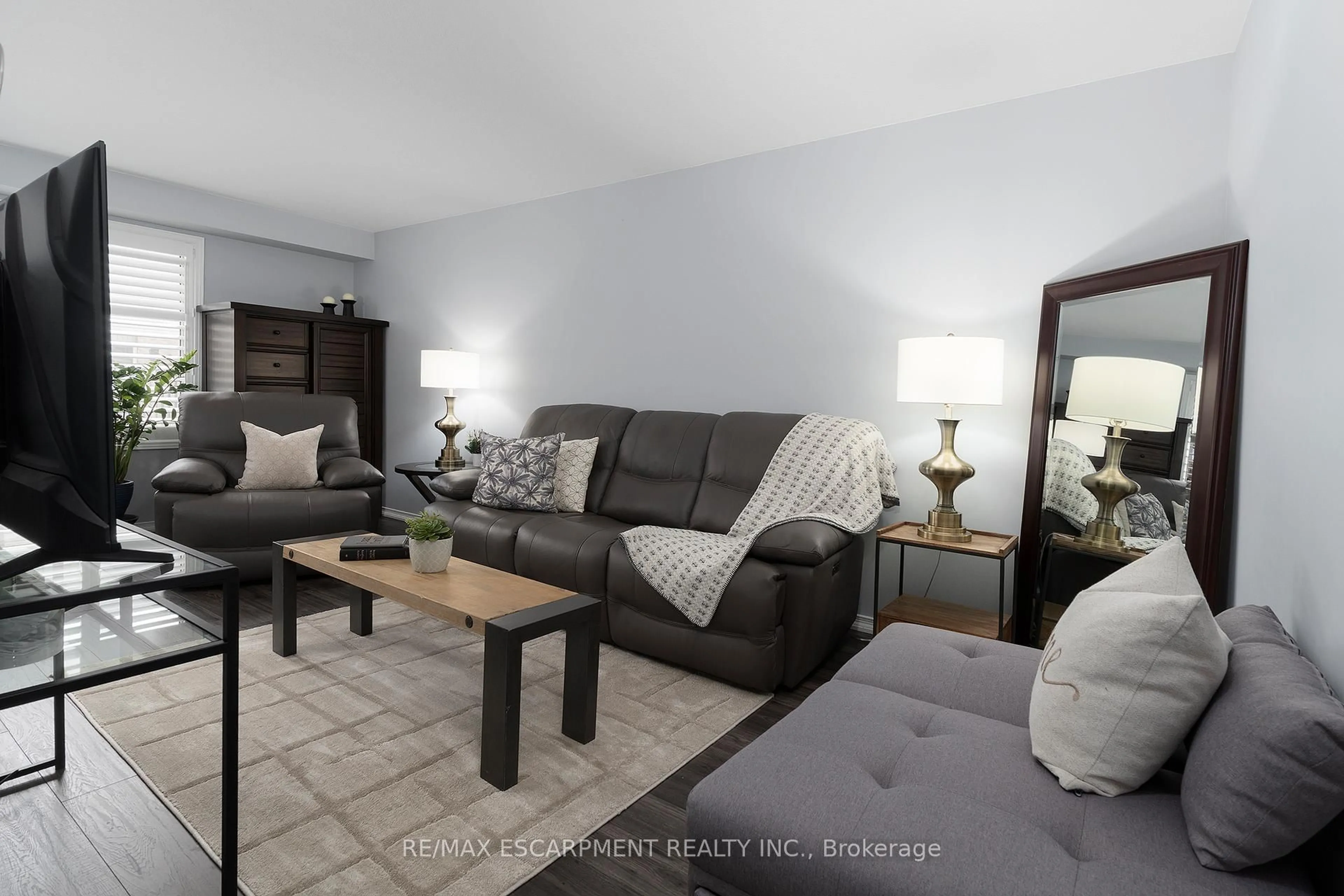 Living room with furniture, unknown for 1523 Upper Gage Ave #10, Hamilton Ontario L8W 1E6